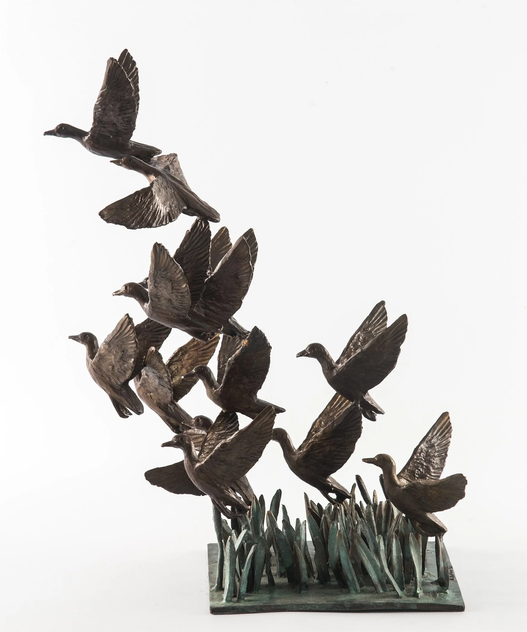 ducks-taking-flight-with-reeds-bronze-study-03.jpg