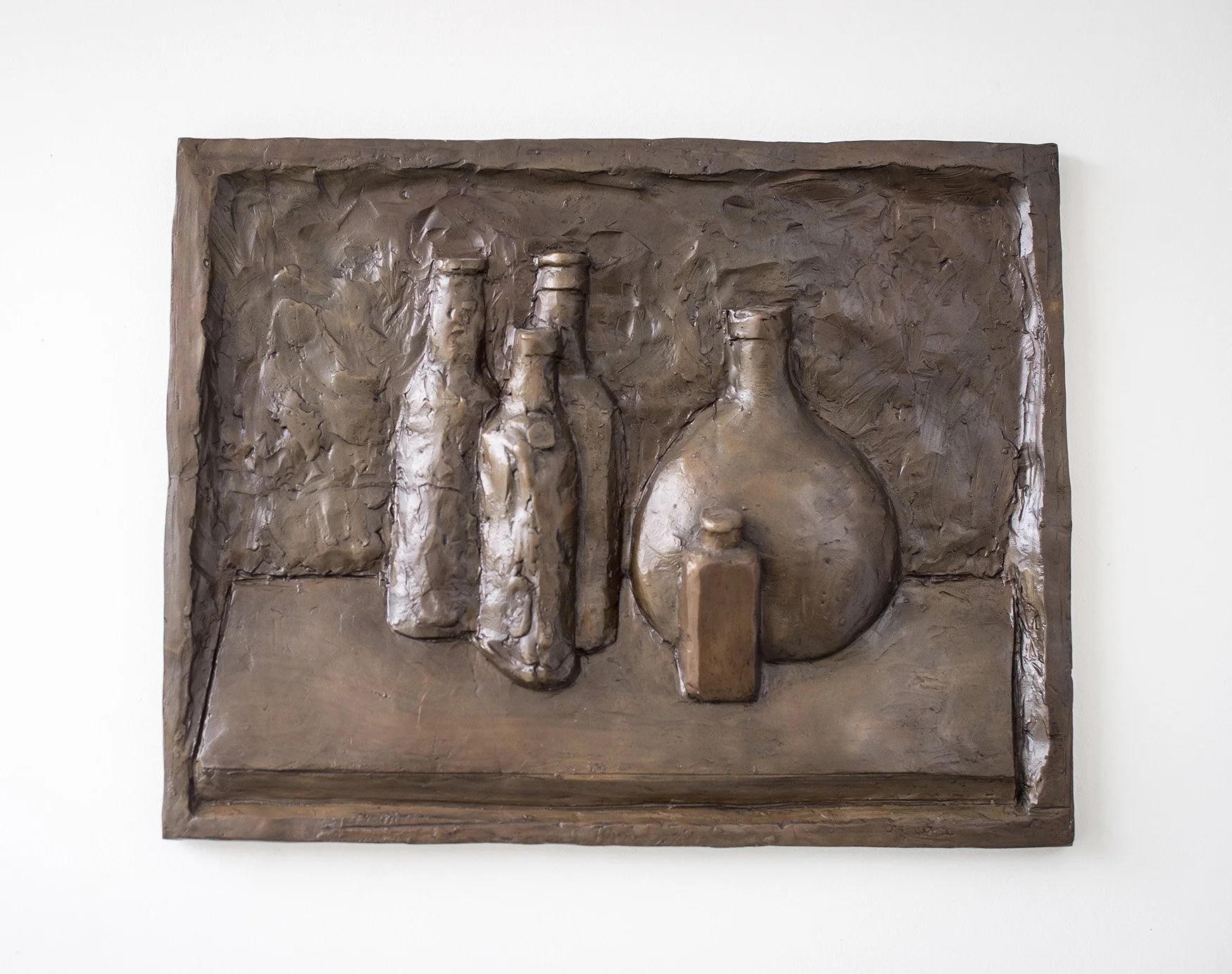 Still Life Relief II life size bronze relief sculpture of bottles