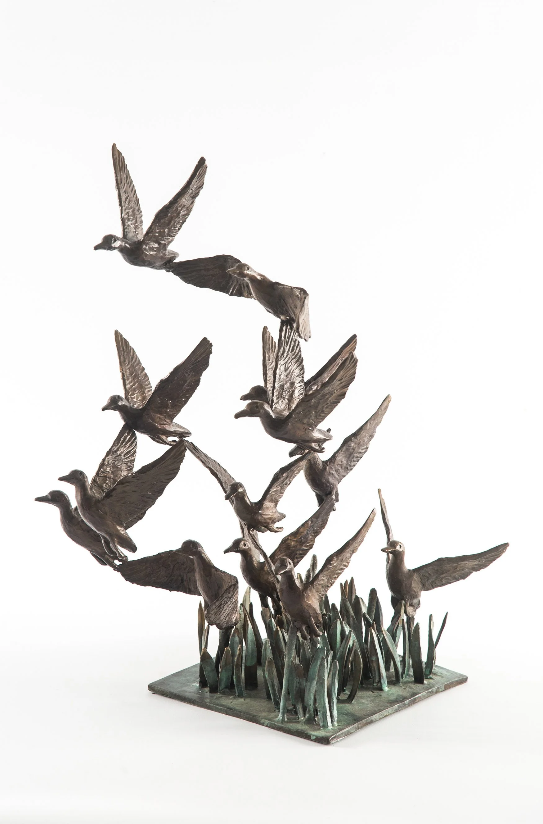 ducks-taking-flight-with-reeds-bronze-study-01.jpg