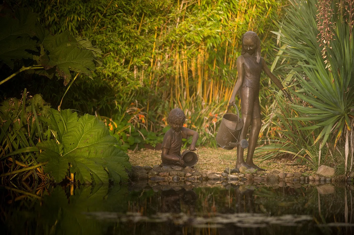 bronze-sculptureyoung-girl-with-watering-can-v4.jpg