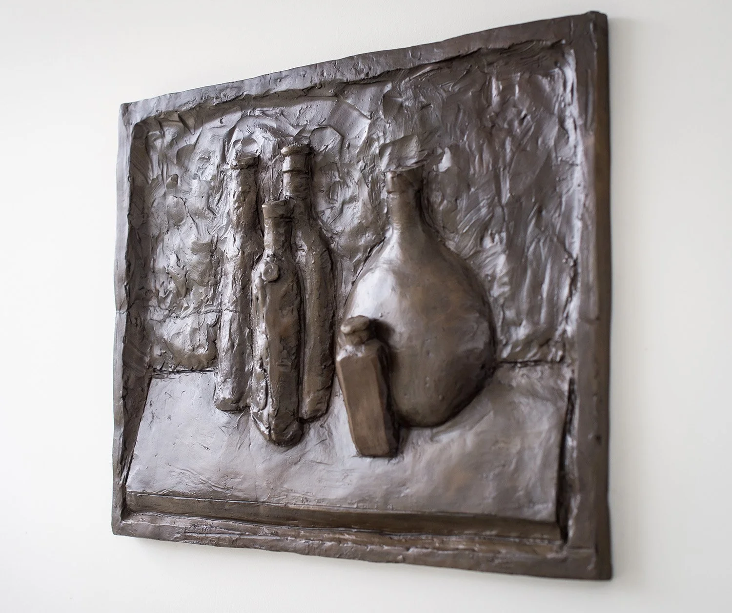 Still Life Relief II life size bronze relief sculpture of bottles showing depth