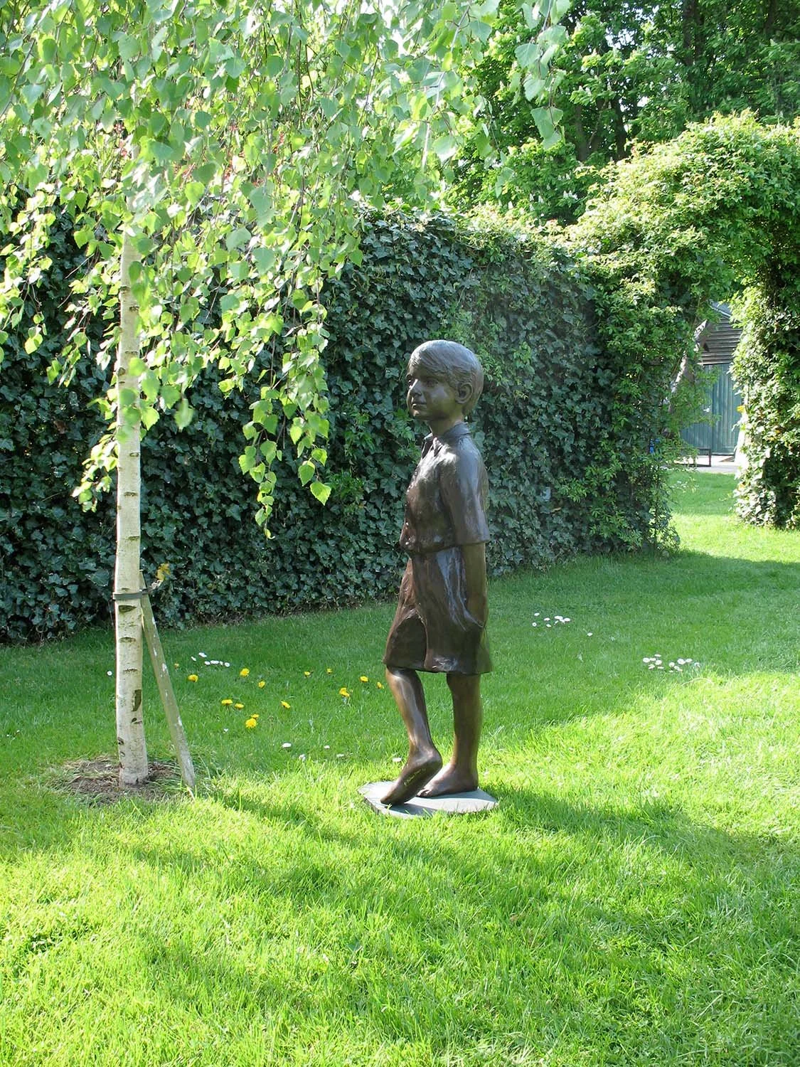 bronze-sculpture-boy-holding-ball-v1.jpg