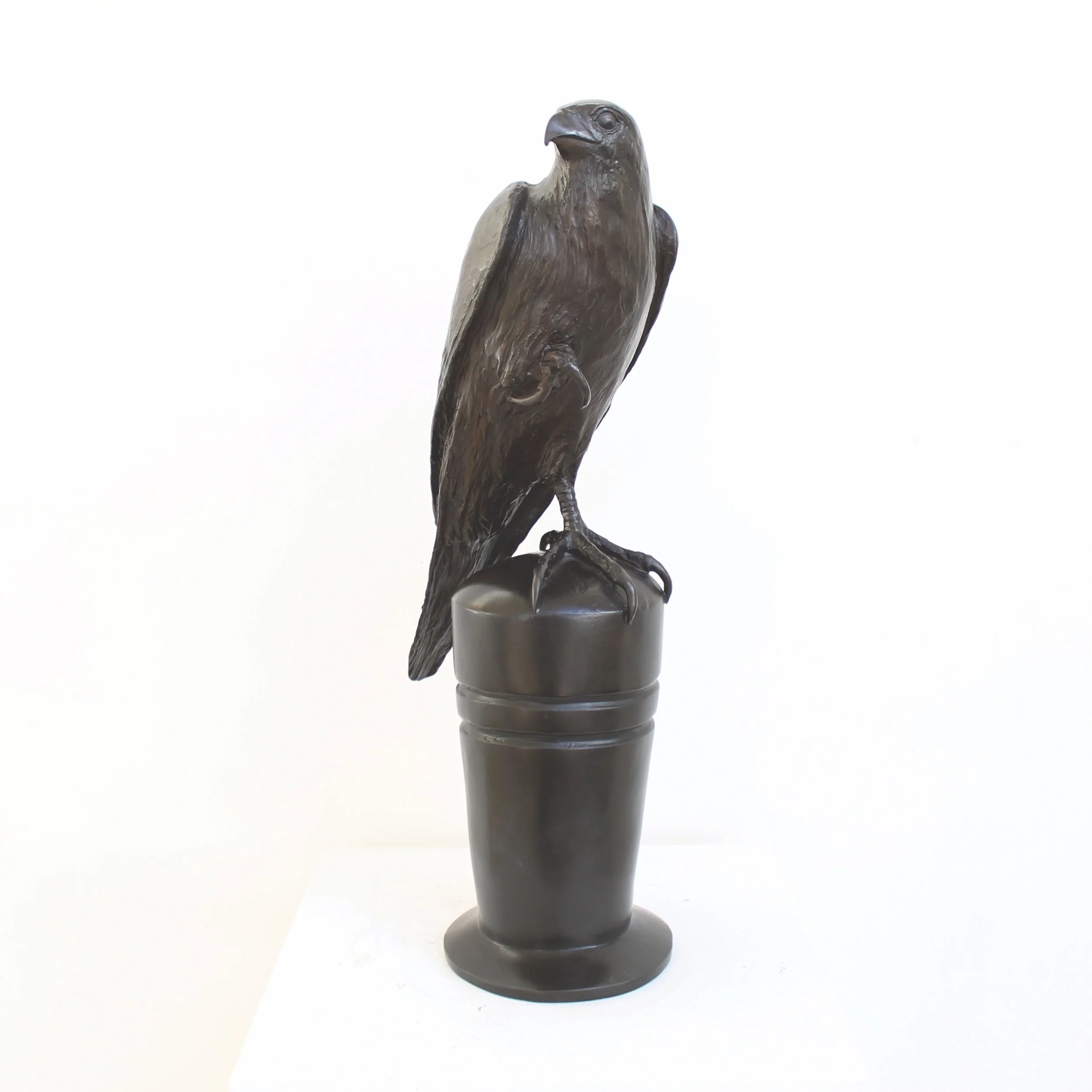 falcon-on-perch-bronze-sculpture.jpg