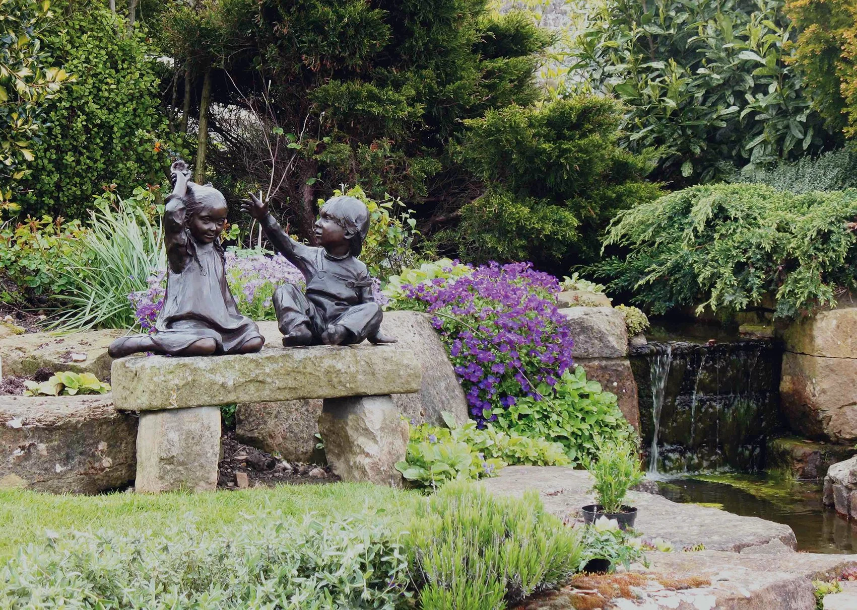 Childsplay Figure Sculptures by Judith Holmes Drewry.jpg