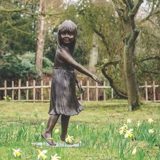 bronze-sculpture-child-twirling-v2.jpg
