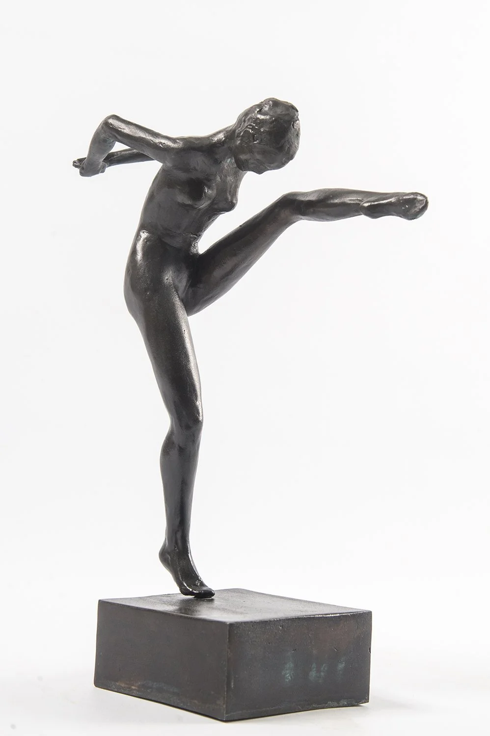 Study in Movement Female I small bronze sculpture study female figure in movement one leg raised high toes pointed hands clasped behind back head bent over nose to knee