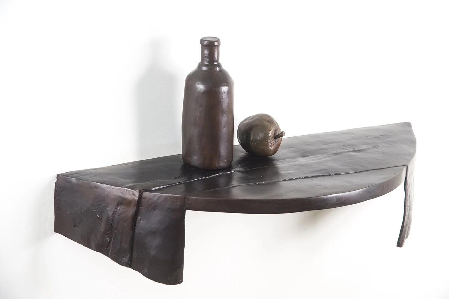 Still Life II life size bronze sculpture semi circular shelf with cloth bottle and apple side view
