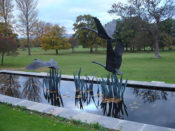 Three Swans in Flight Sculpture by Lloyd Le Blanc