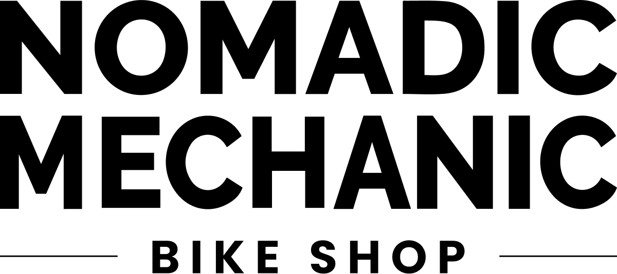 nomadic-mechanic-bike-shop-logo 1.png