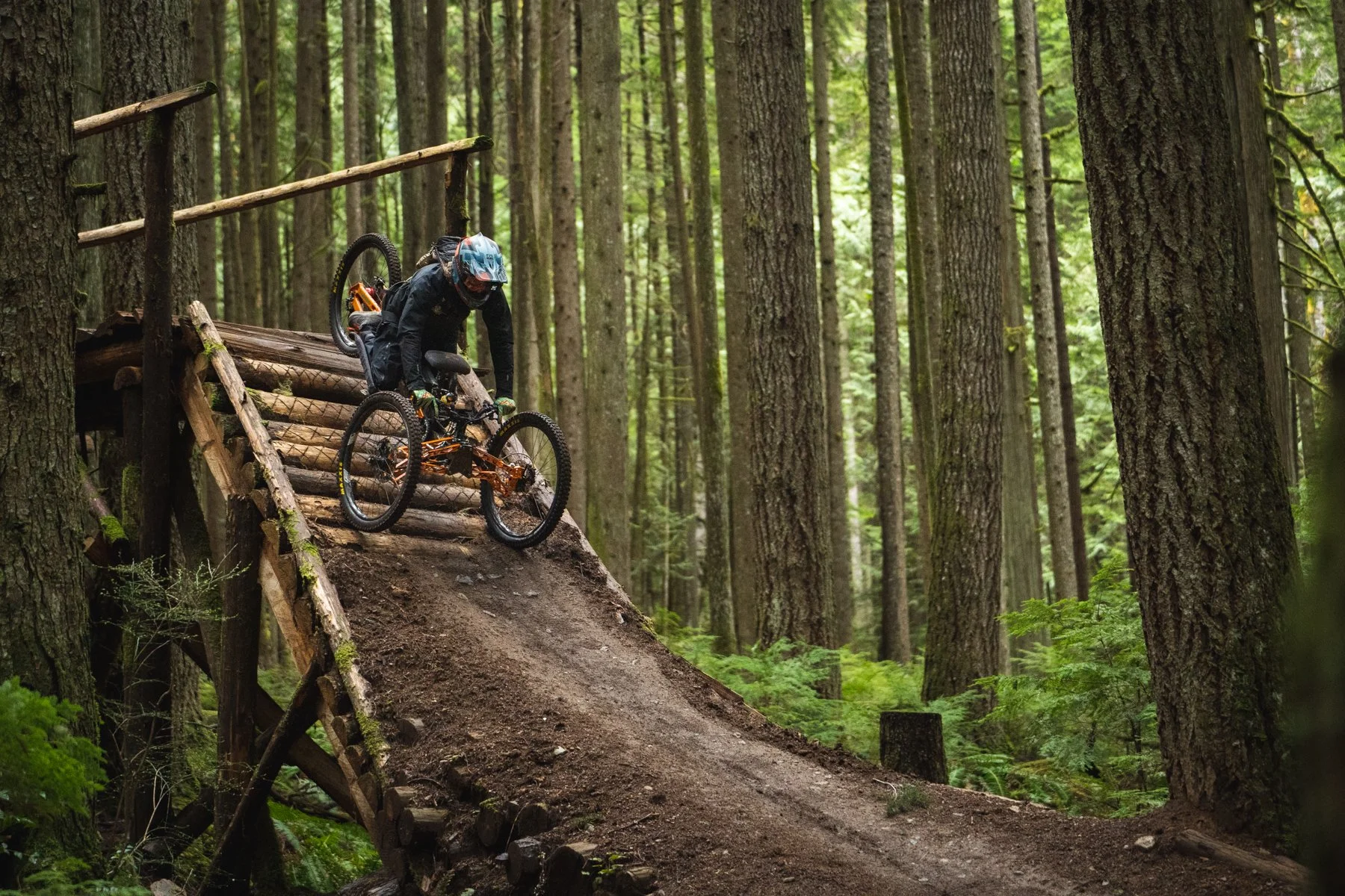 An adaptive mountain biker riding a trail in Squamish, BC
