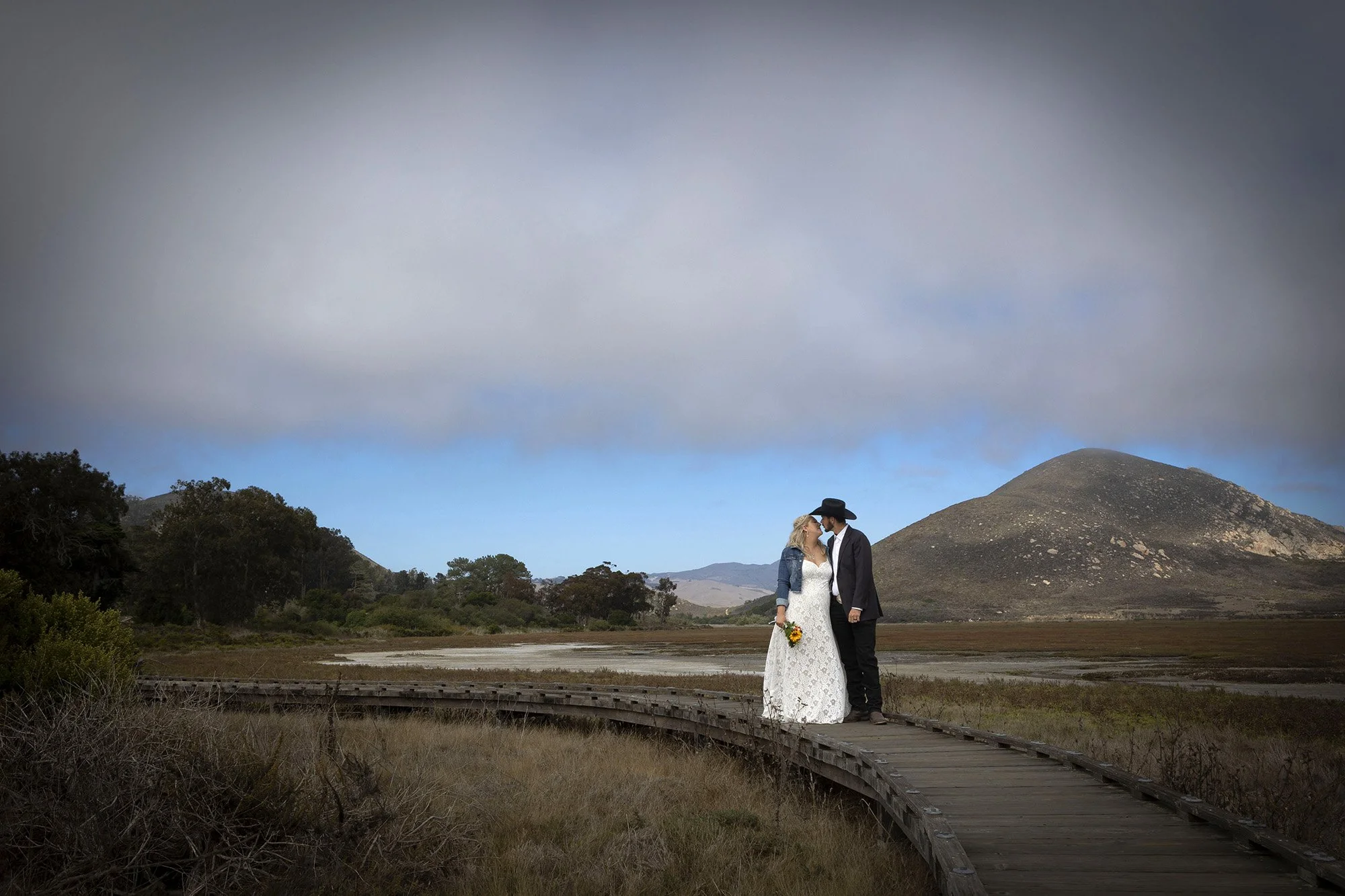 Romantic couple portraits overlooking Morro Bay State Park wetlands