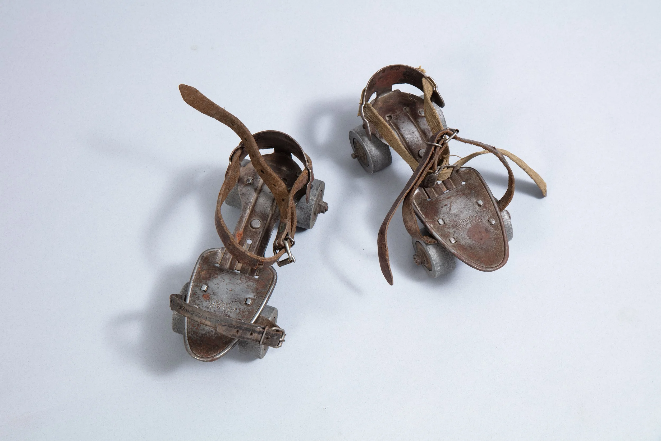 A pair of 1950s adjustable roller skates