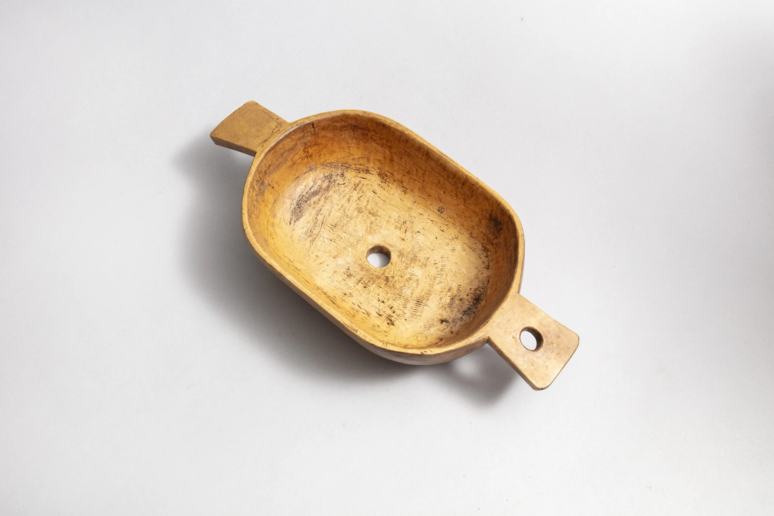 Carved bowl made of solid beech.