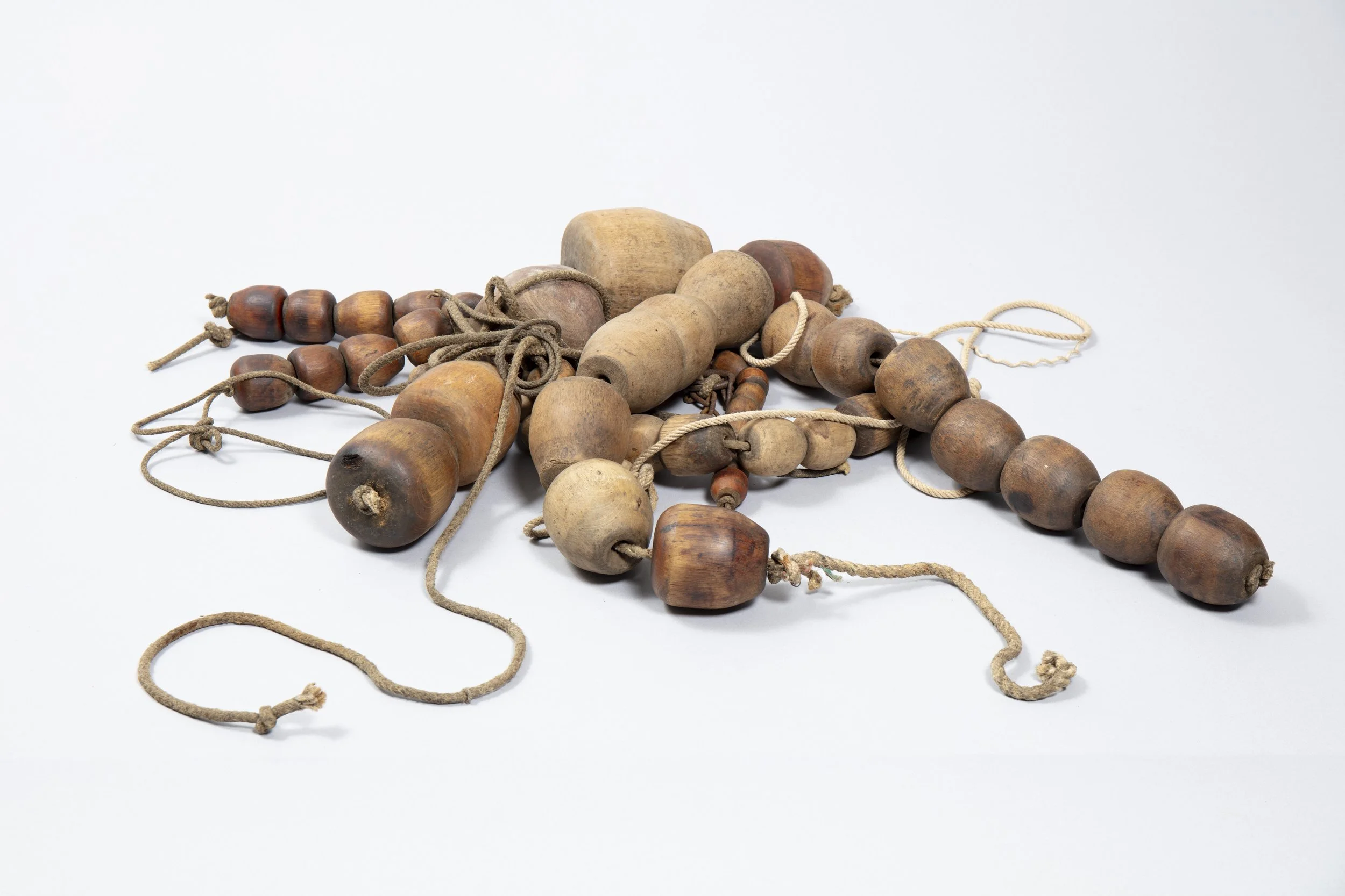 Wooden balls for fishing nets.