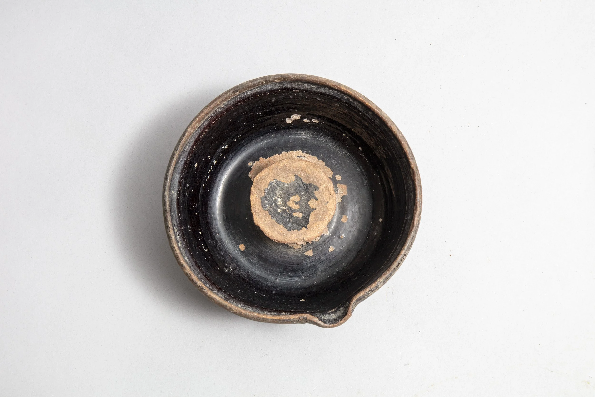 Terracotta dish for cracking nuts