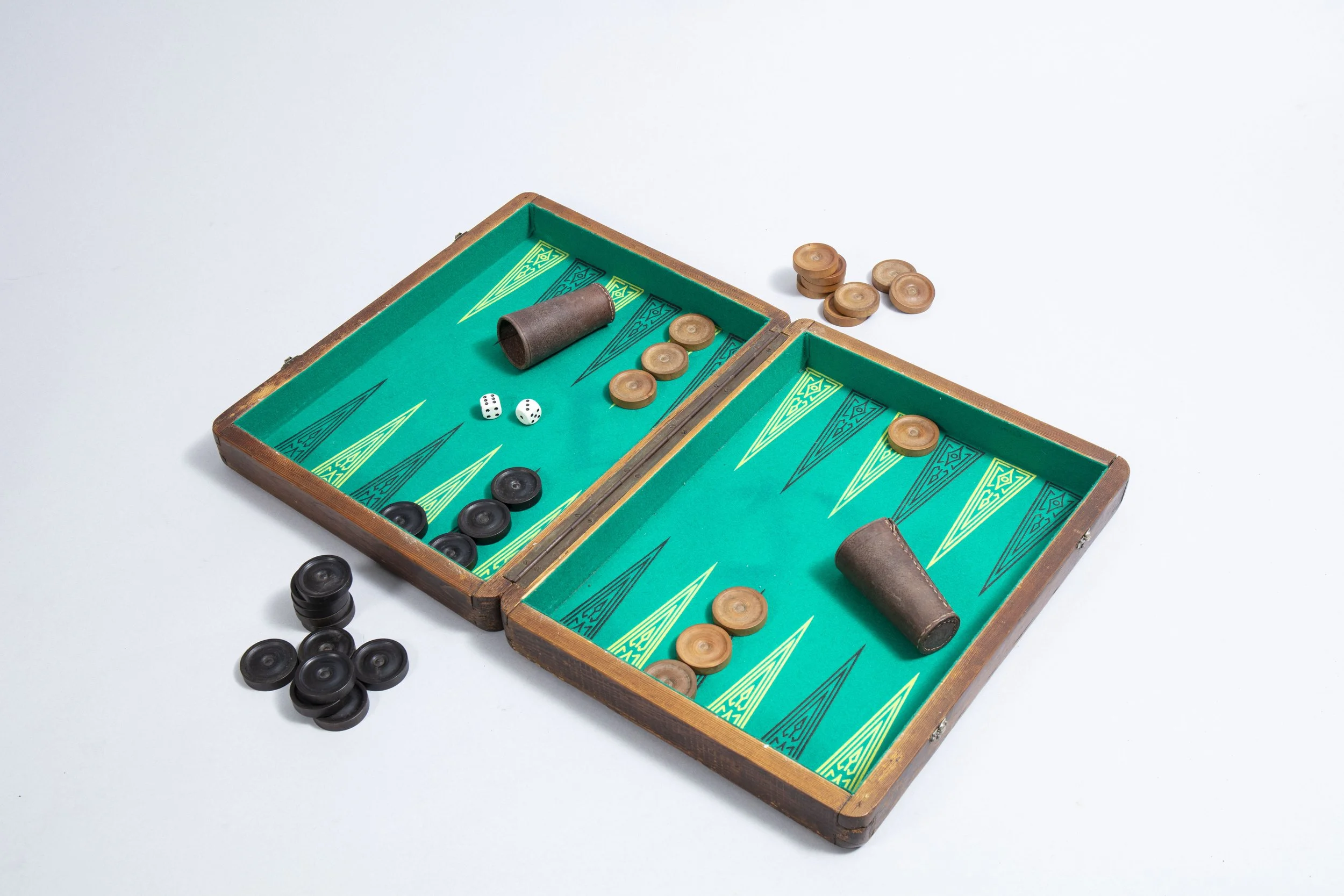 Backgammon set in a wooden case.