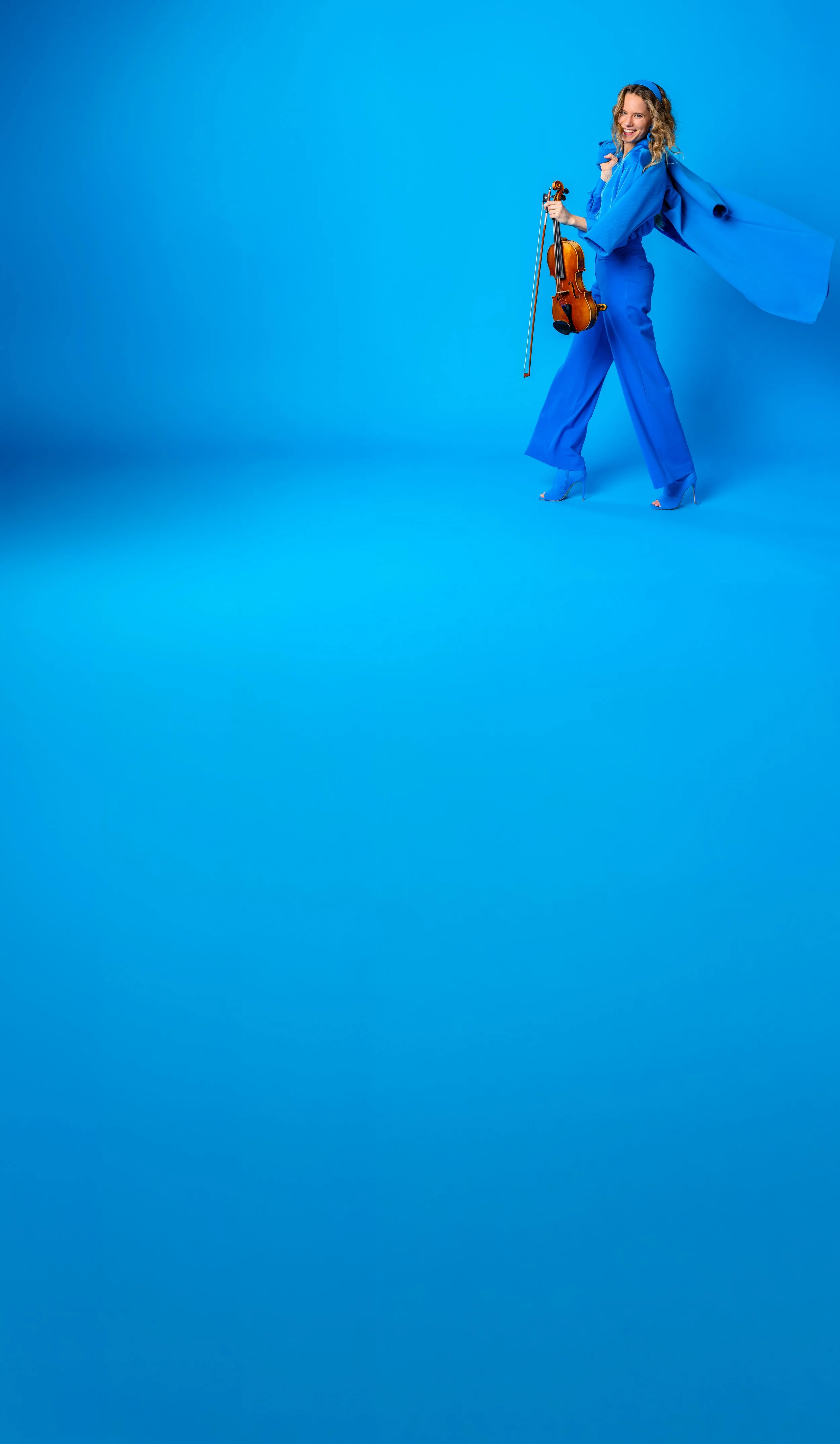 BLUE BACKGROUND OFF CENTER.jpg