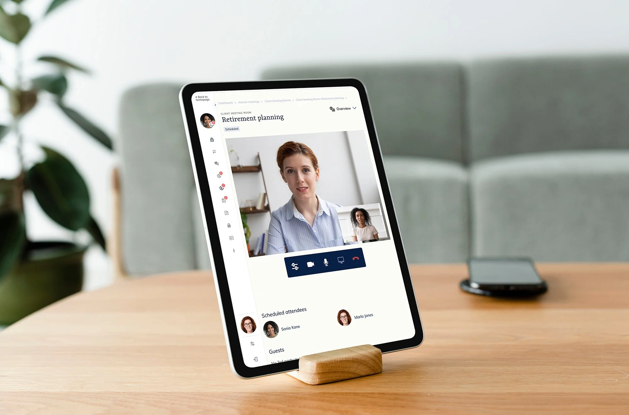 Financial adviser holding virtual client meeting using video conferencing technology