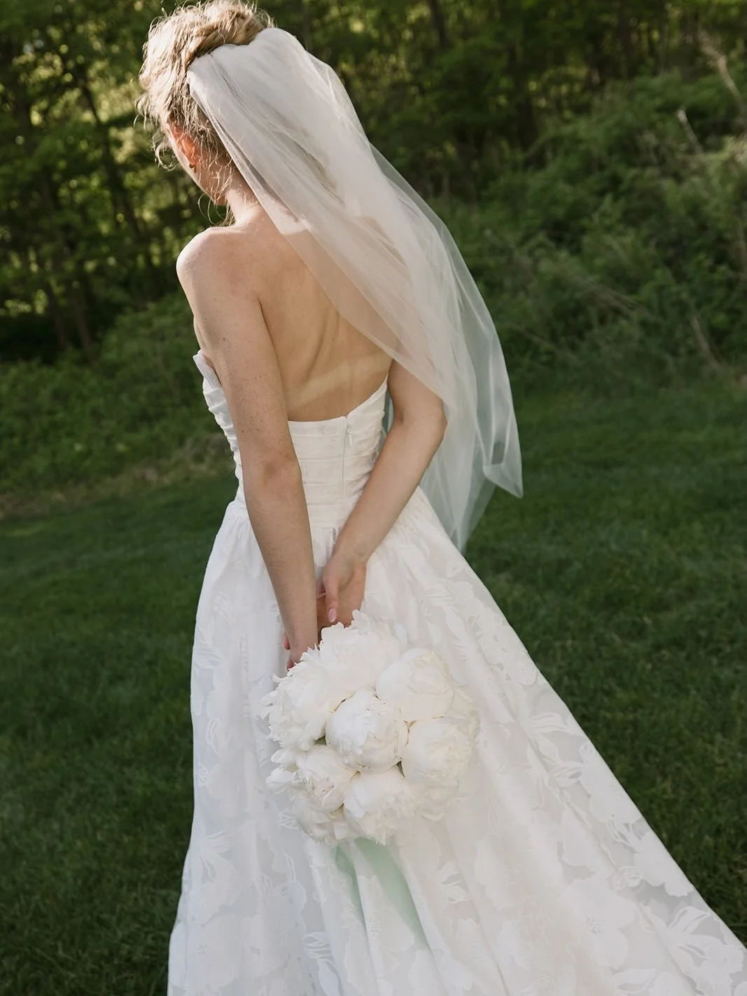 A fluffy bouquet of peonies and a wind tossed veil. What more could a bride need? 

Photos: @kaycollective.co 
Venue: @hiddenmeadowandbarn 
Hair/Makeup: @ladyvampartistry 
Gown: @whitemagnoliabridal
