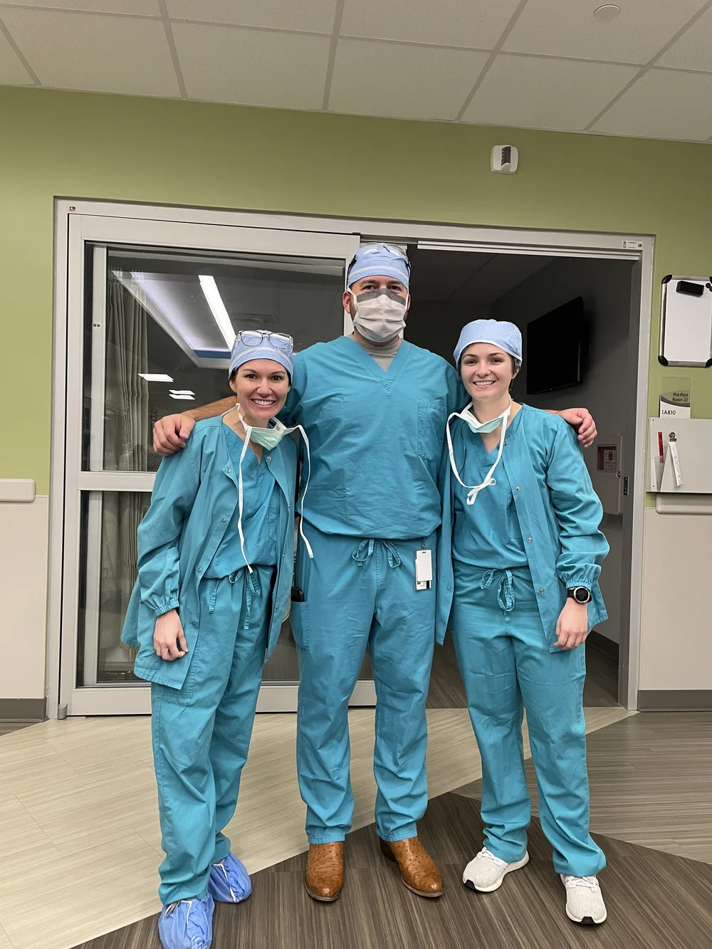 Jerrica Watson Kitto physician assistant/associate (PA-C), Dr. Jeremy Burnham MD orthopedic surgeon, Michelle Veillon-Bradshaw medical assistant (MA), medical student teal operating room scrubs