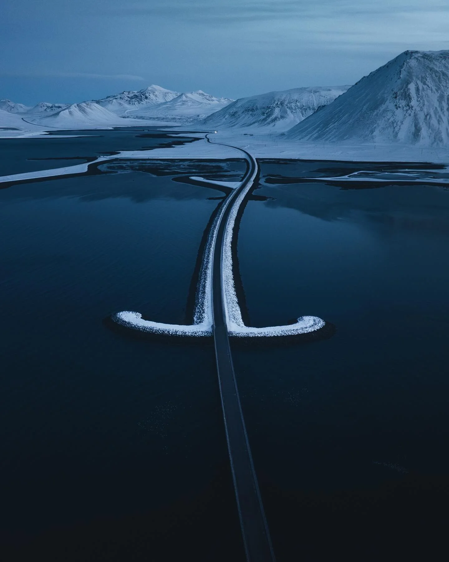 few perspectives on iconic Sneafellsnes sword bridge, winter blue hour version 🗡️ which one is your favorite? 

#iceland #dji #canon #landscapephotography