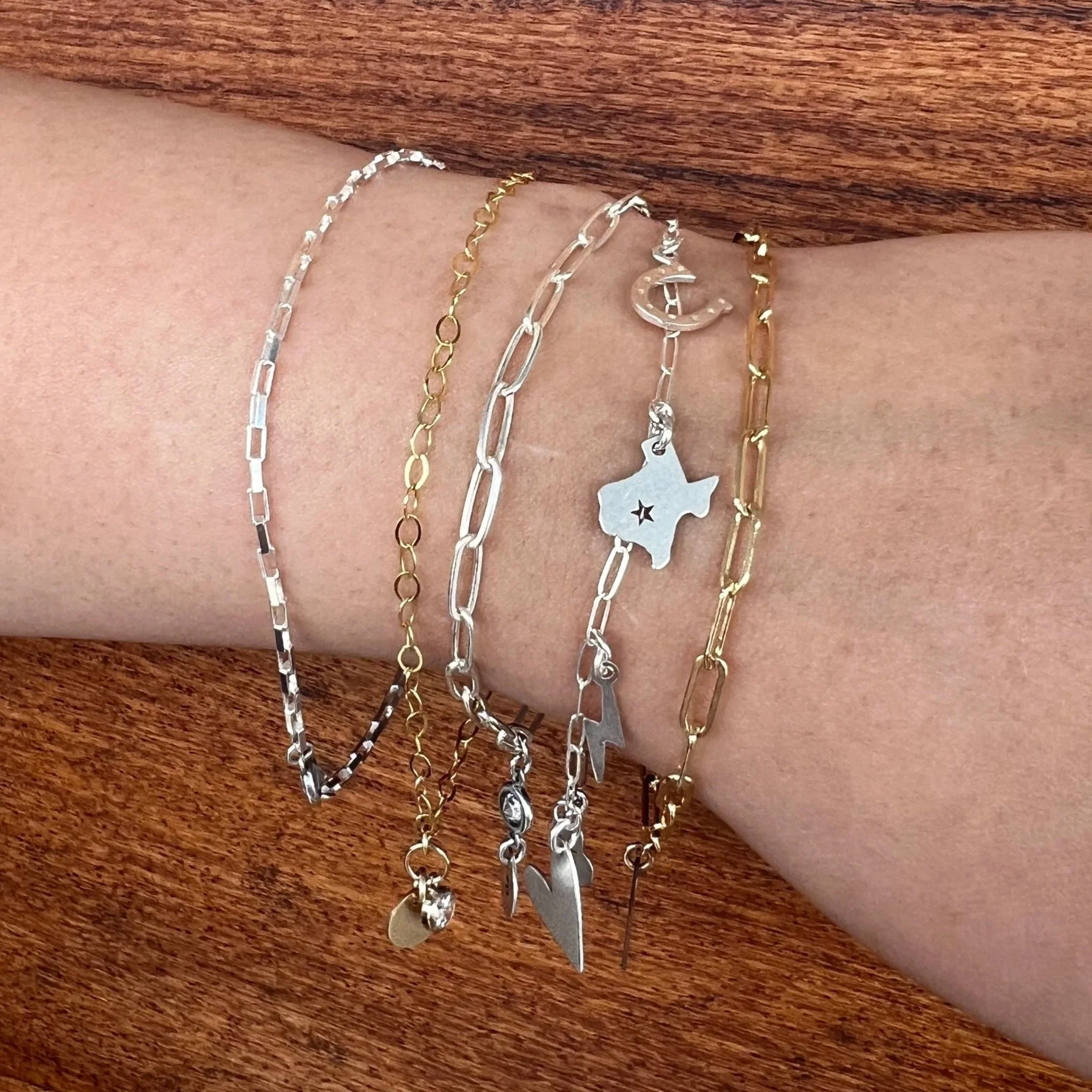 Permanent Jewelry Austin-largest chain and charm selection. Spare Finery/Lisa Crowder Studio