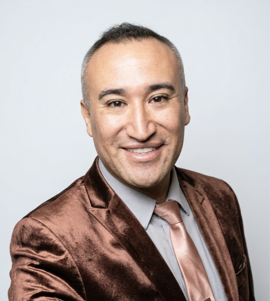 Georgie San Miguel, hospitality advisor for Party on a Tuesday and 25-year Marriott veteran, at Colorado Startup Week's annual Denver networking event