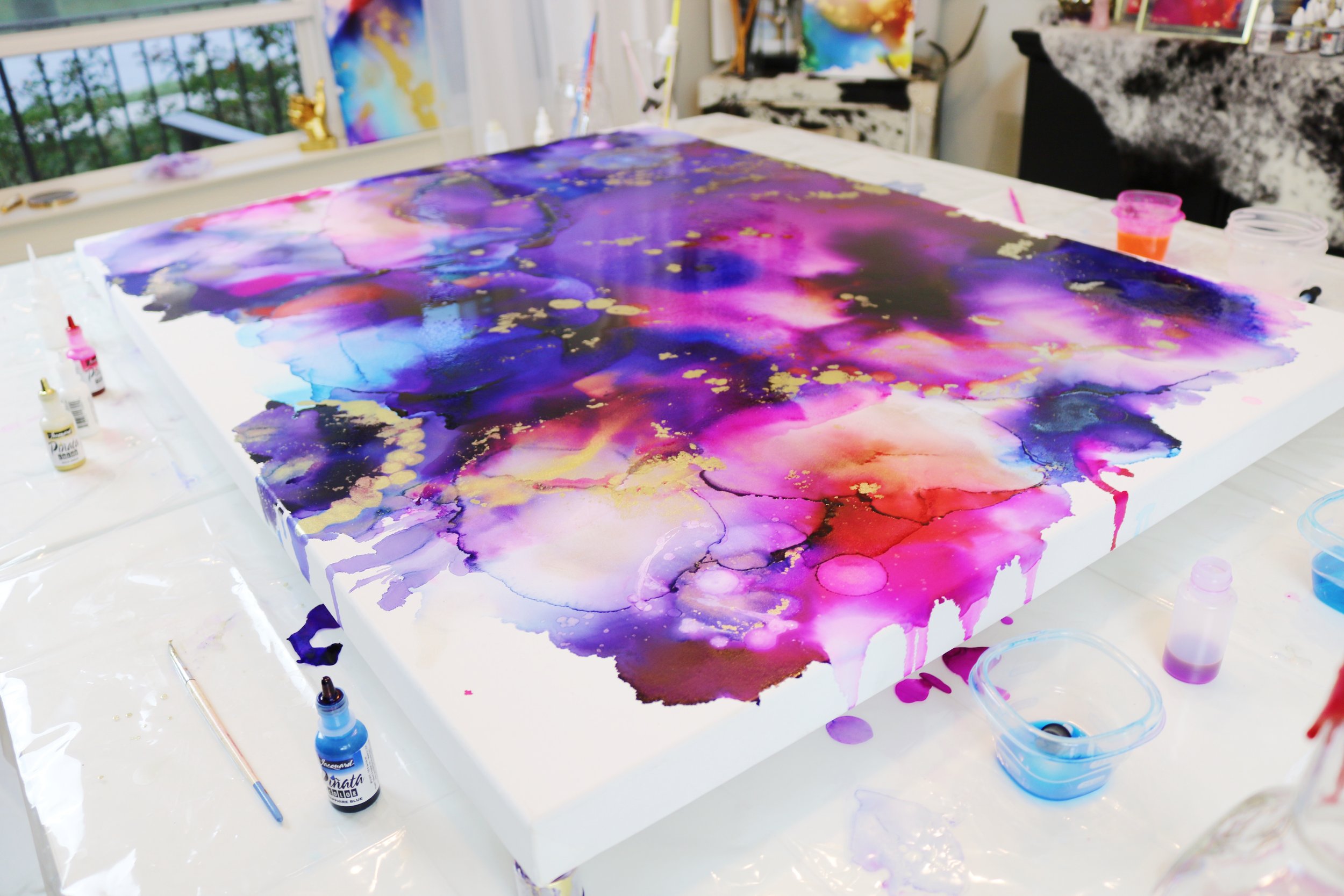 Painting Alcohol Ink on Canvas vs. yupo paper - 5 ways to make paint flow seamlessly
