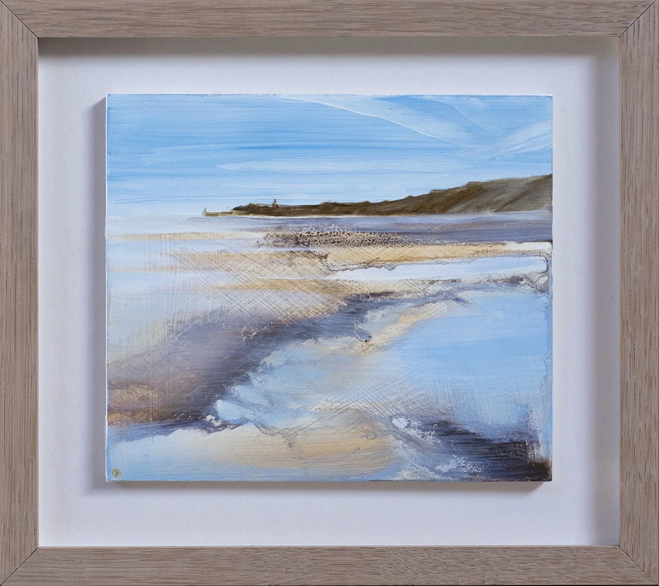Painting of a coastal landscape with blue sky, distant hills, sandy beach, and water reflecting the sky, framed in light wood.