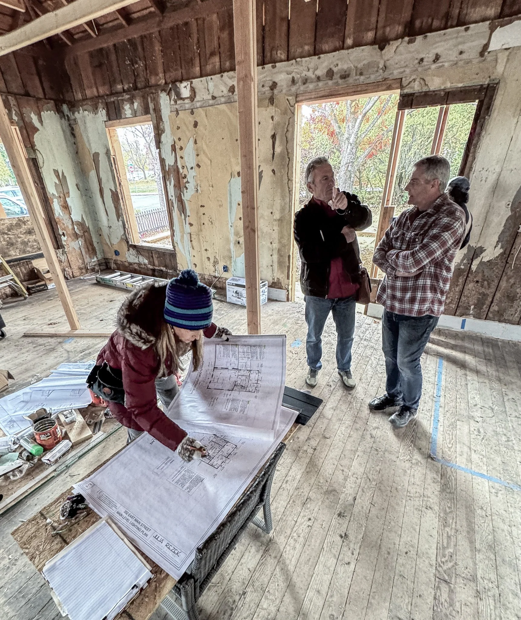 TOM-JULIA REZEK-JOHN LOOKING AT PLANS-2.jpg