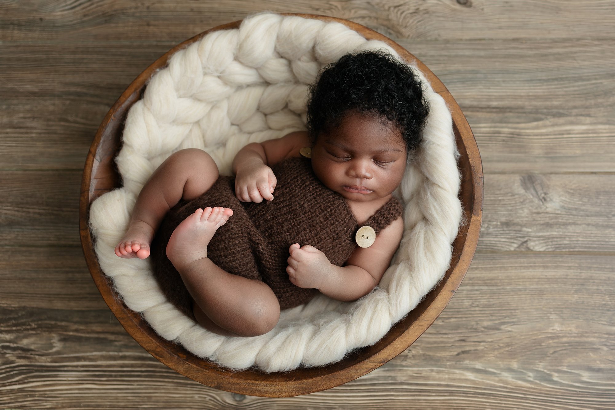 Alexandria Virginia newborn baby boy posing in newborn studio.