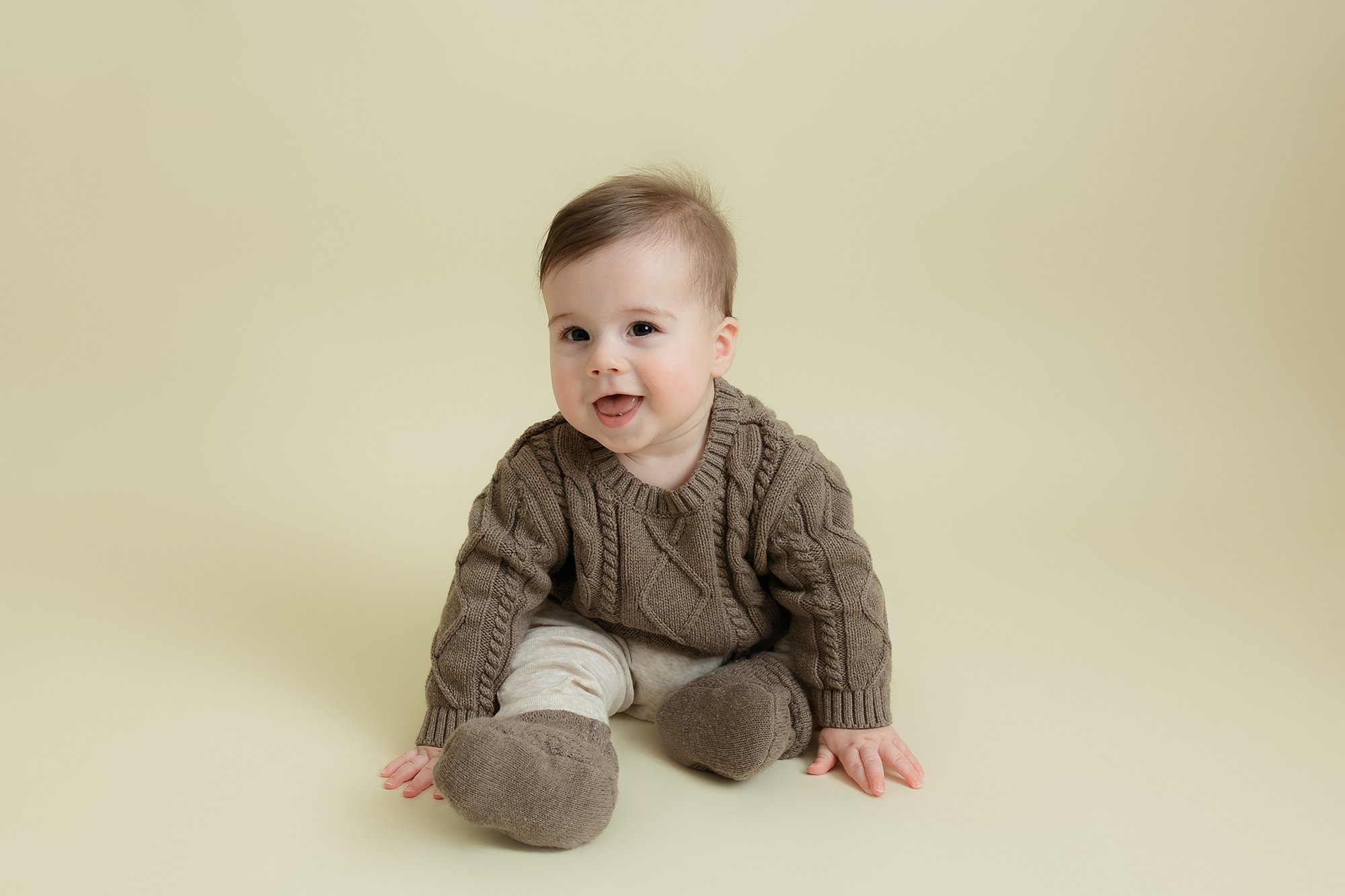 Sweet baby boy happy and smiling in his photos during his session at my studio located in Manassas, Virginia.