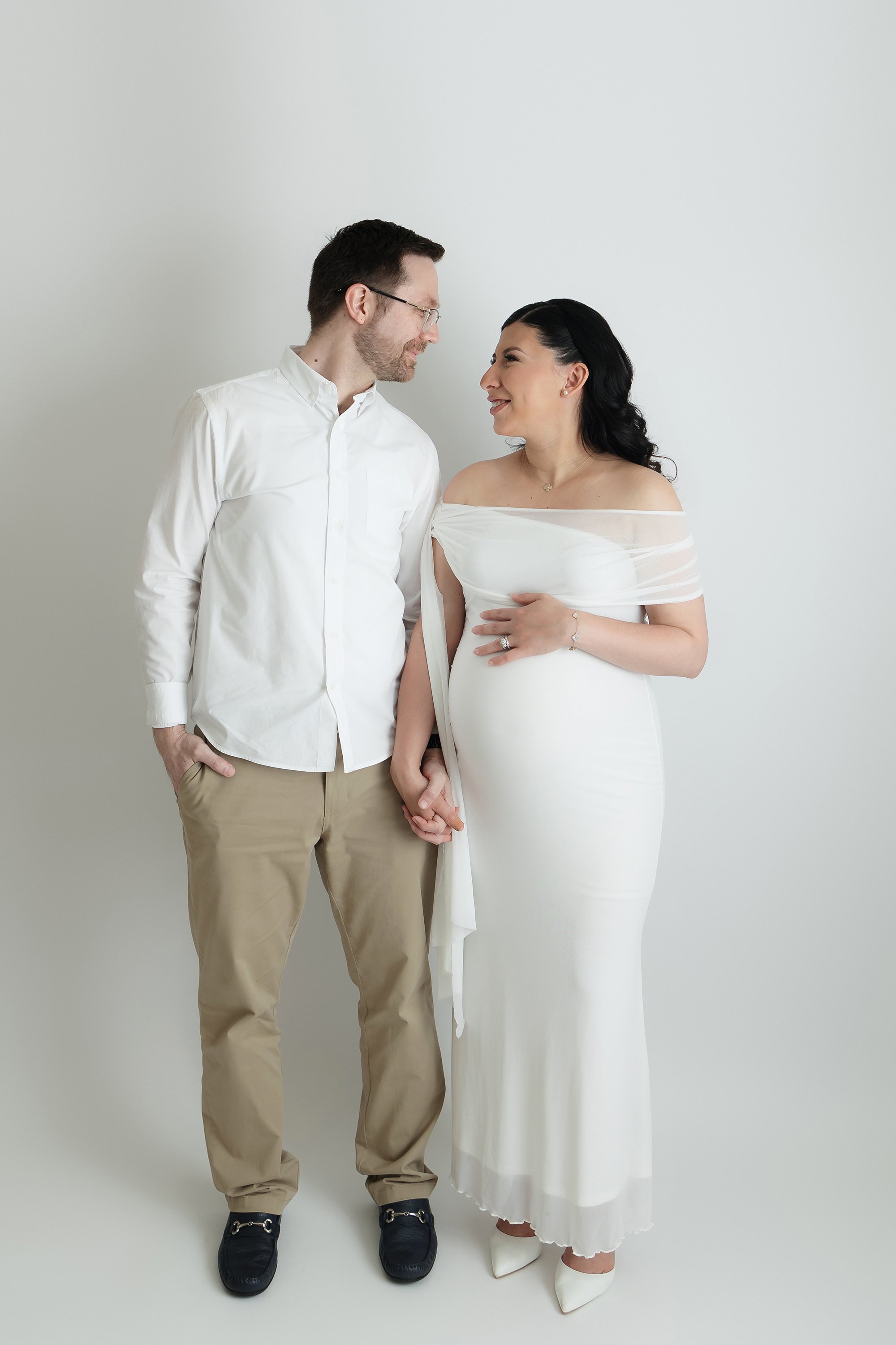 classic couple maternity photos in northern Virginia studio