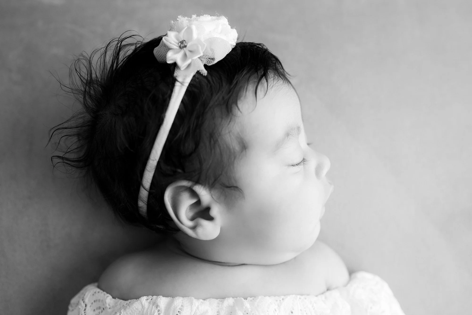 A close-up of a newborn baby’s chubby cheeks, highlighting the pure essence of a new beginning.