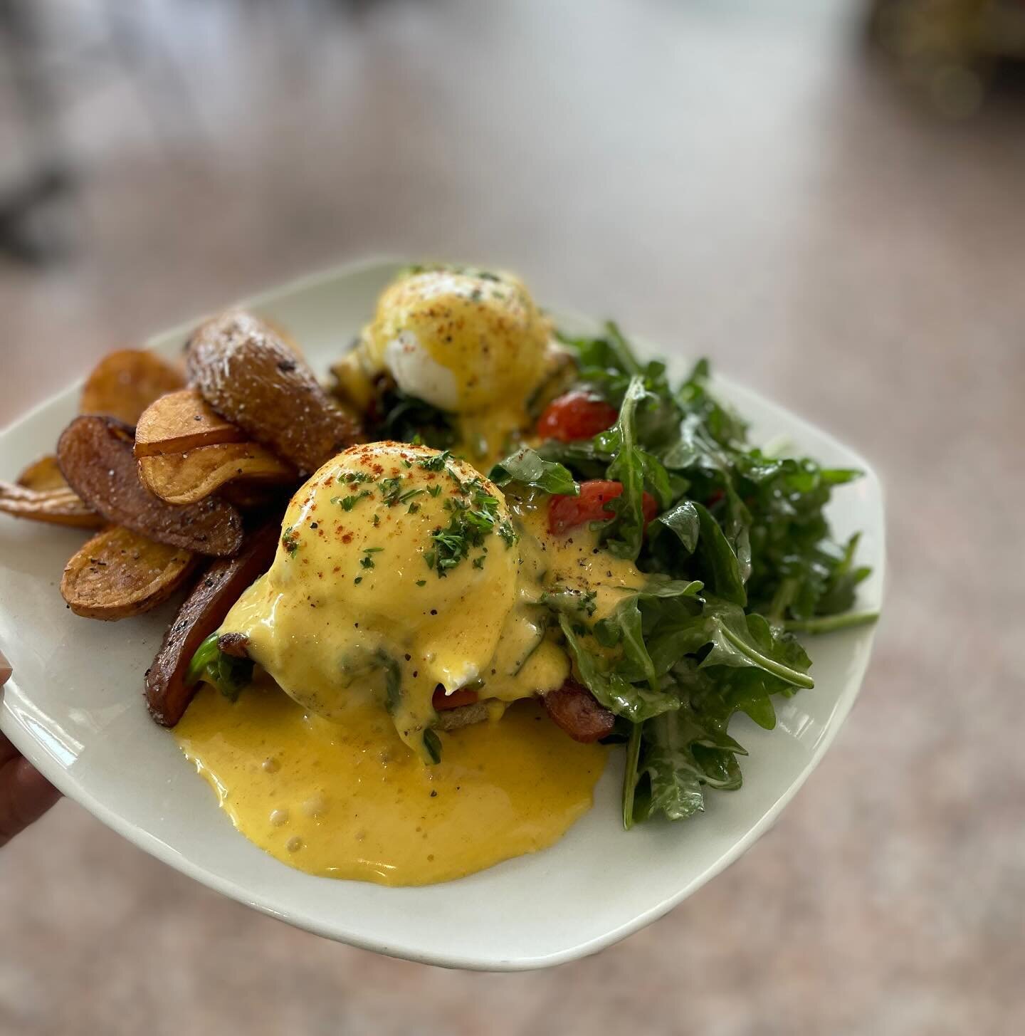 Can you think of a more fabulous meal for brunch than Eggs Benedict? A buttery, toasted English muffin, crisped mortadella, soft poached egg, and the creamiest brown butter hollandaise sauce. 
We have fun variations with crab, mushrooms, or just a cl