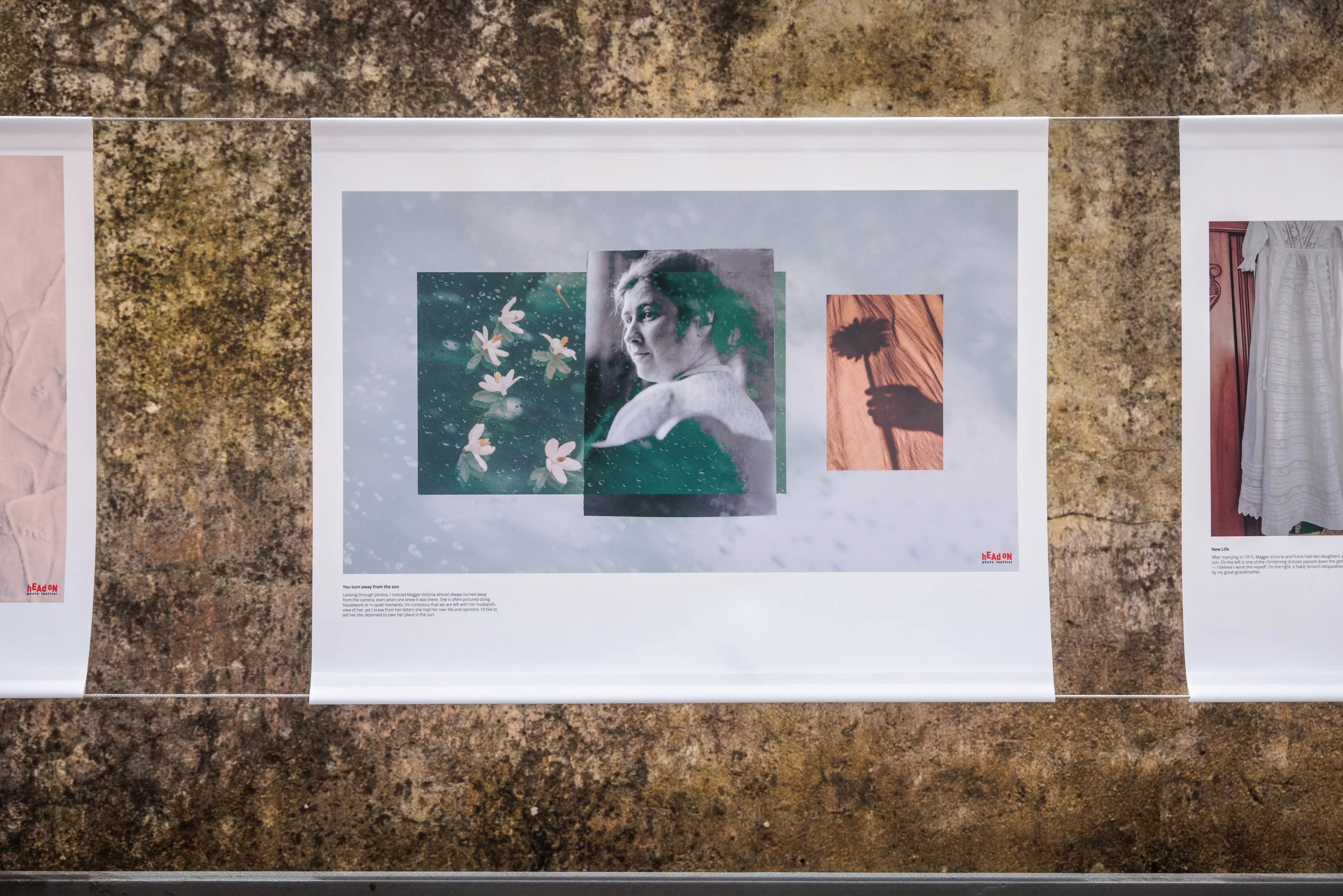 Photograph of a printed collage featuring a black and white portrait of a woman, alongside a color photo of flowers, and a small inset image of a shadow of a flower with an orange background, displayed on a textured surface.
