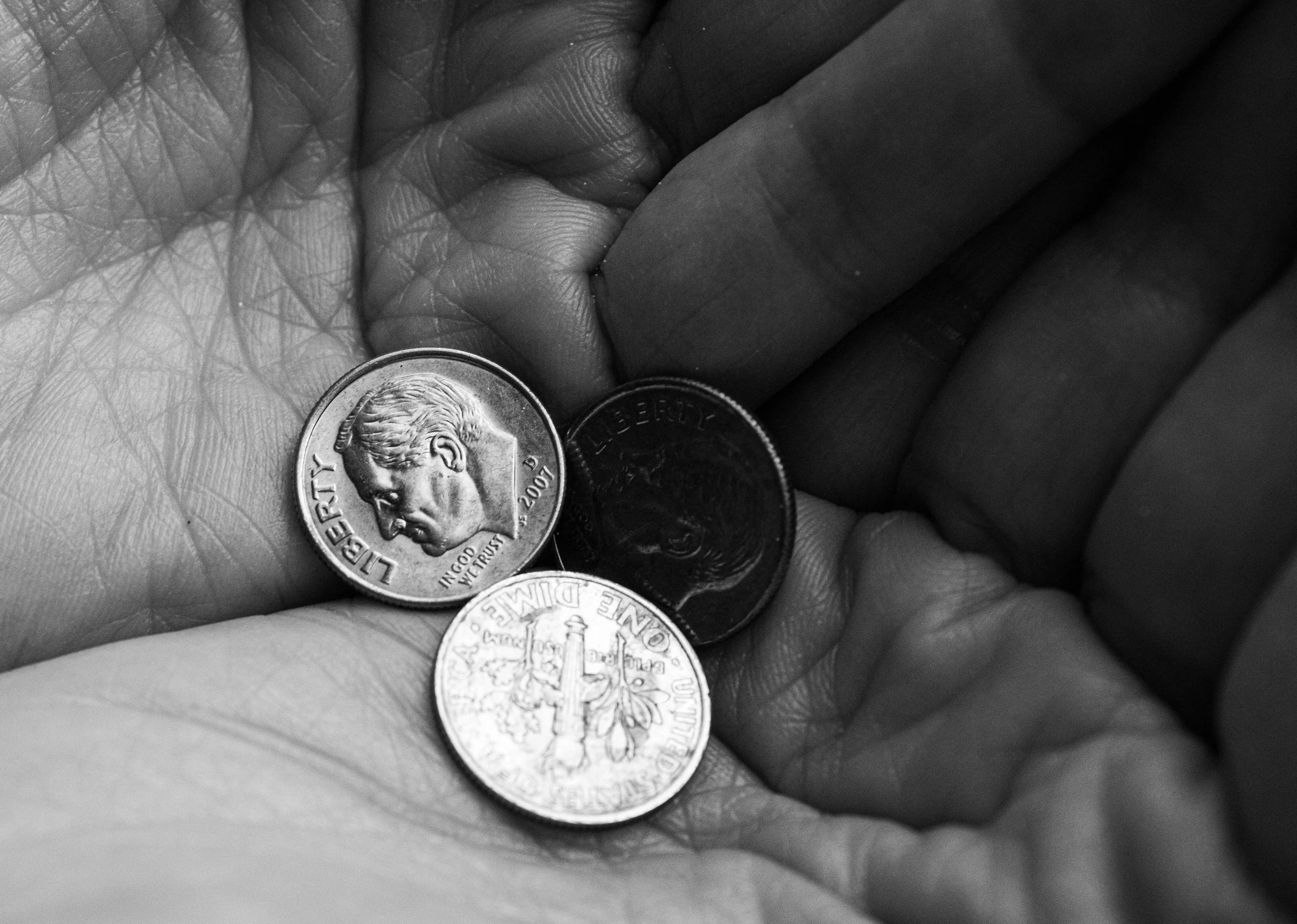  &nbsp;My mother, Kathi Nicholas, cups her hands to hold three shiny dimes for my camera to capture. This wouldn’t be the first time members of my family take pictures of dimes we find by happenstance, as many of us in my mother’s family believe them