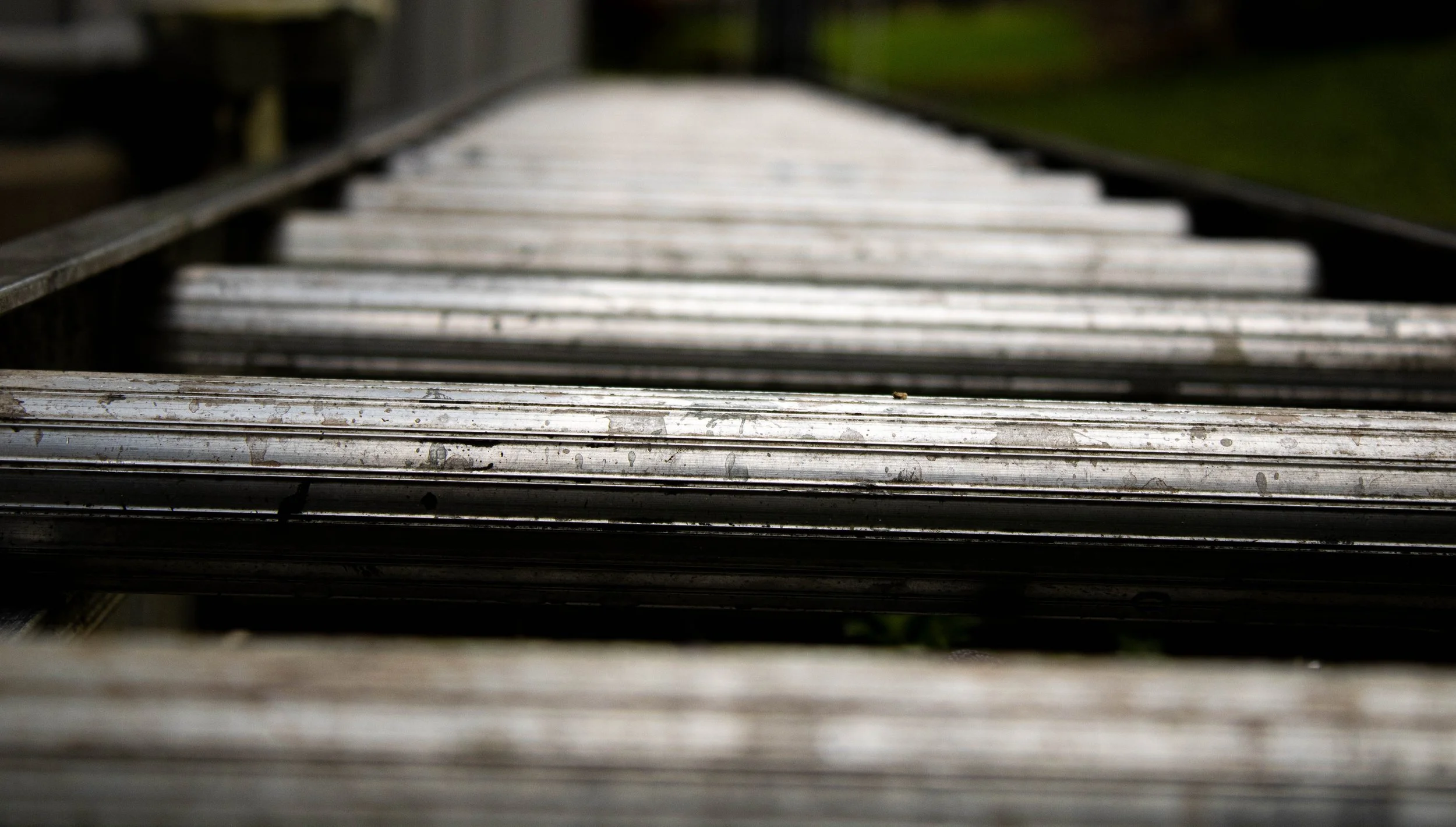  The dirty, well-worn rungs of a waiting ladder extend into the middle distance. (Or: I chose the high road, keeping the dirty, well-worn ladder beneath my feet rather than above my head) Whether or not the inception of the superstition arose from an