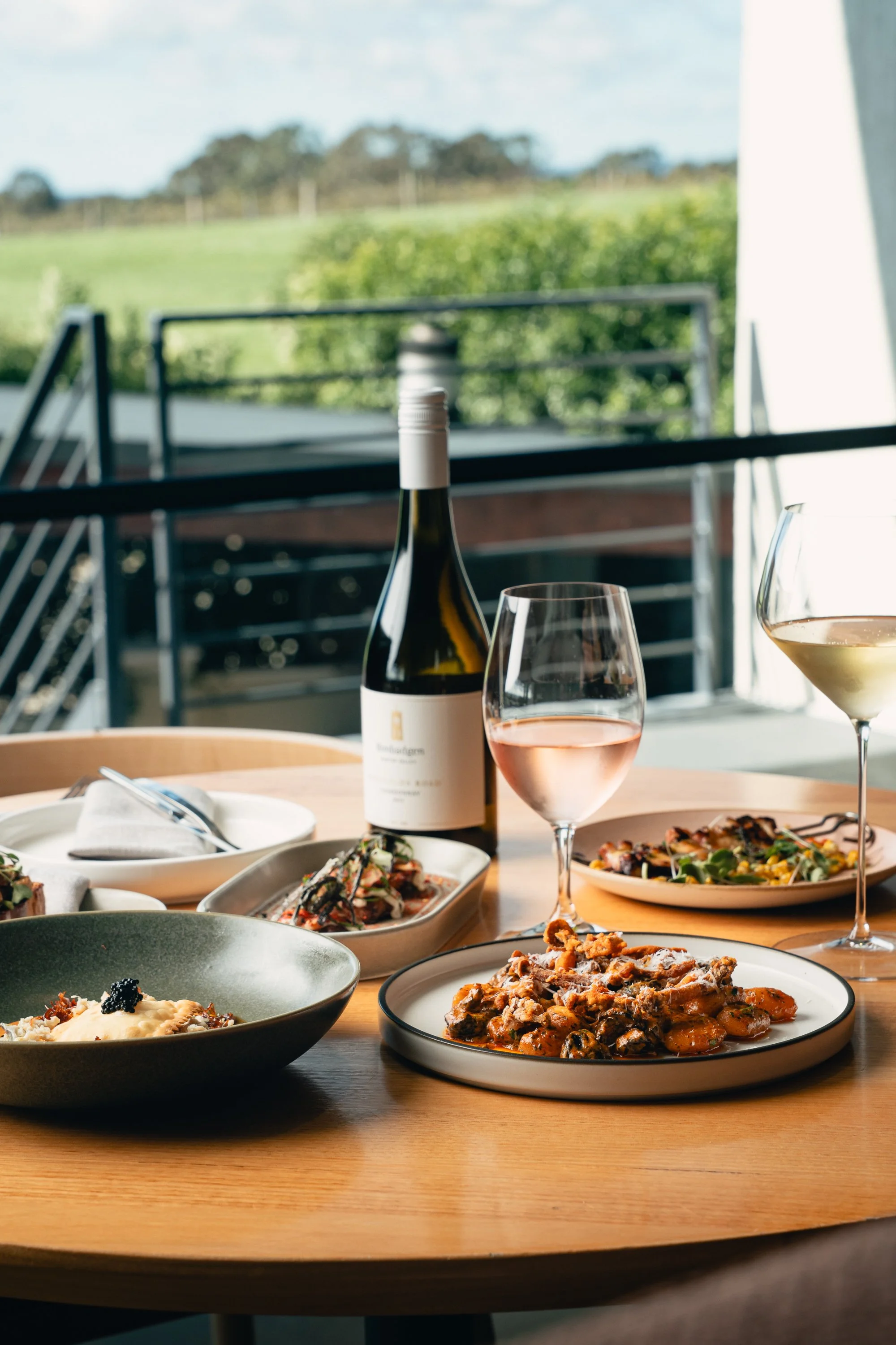 dishes on a table with bimadgen wine
