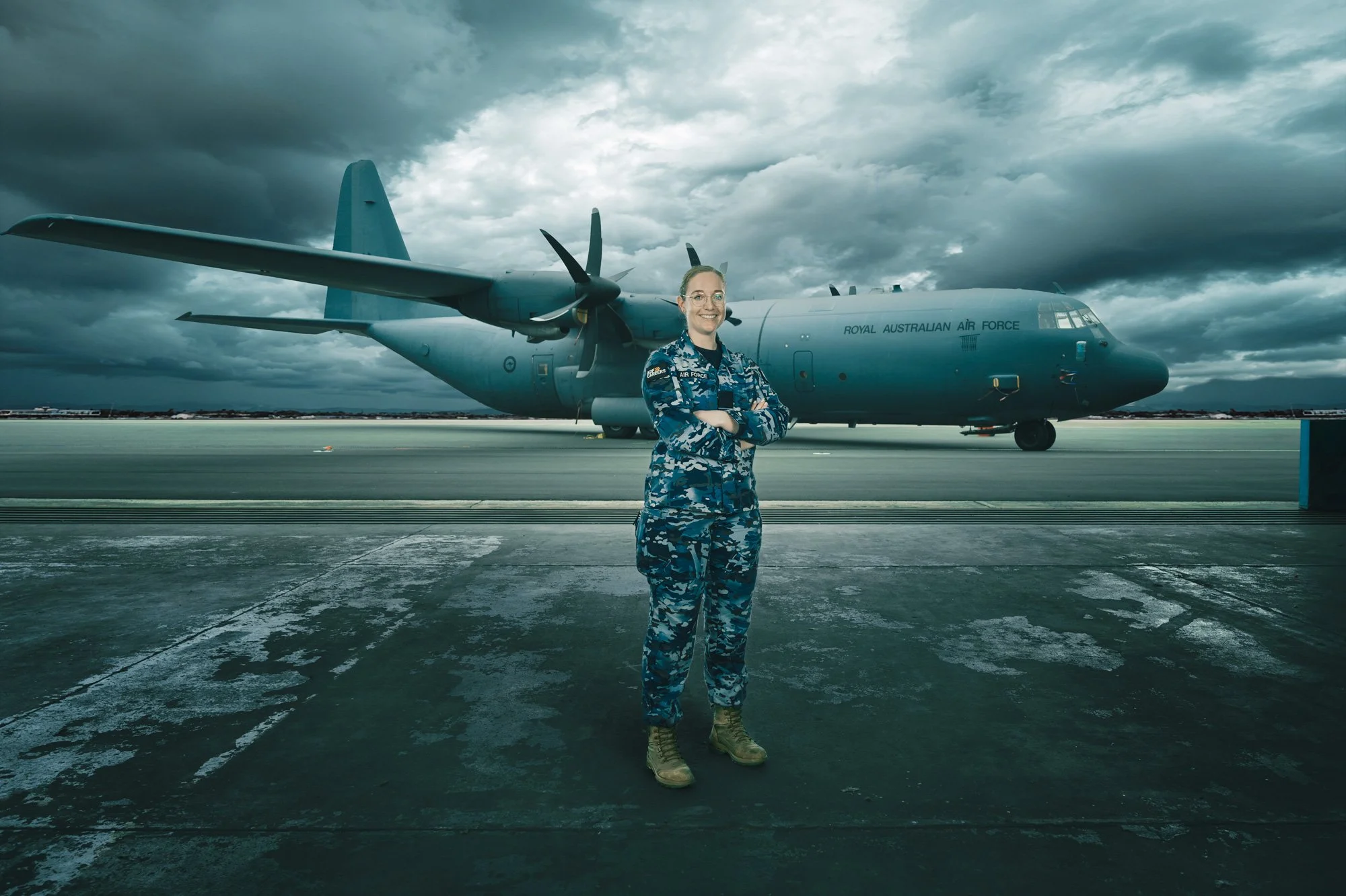Female airforce officer standing infront of an aeroplane