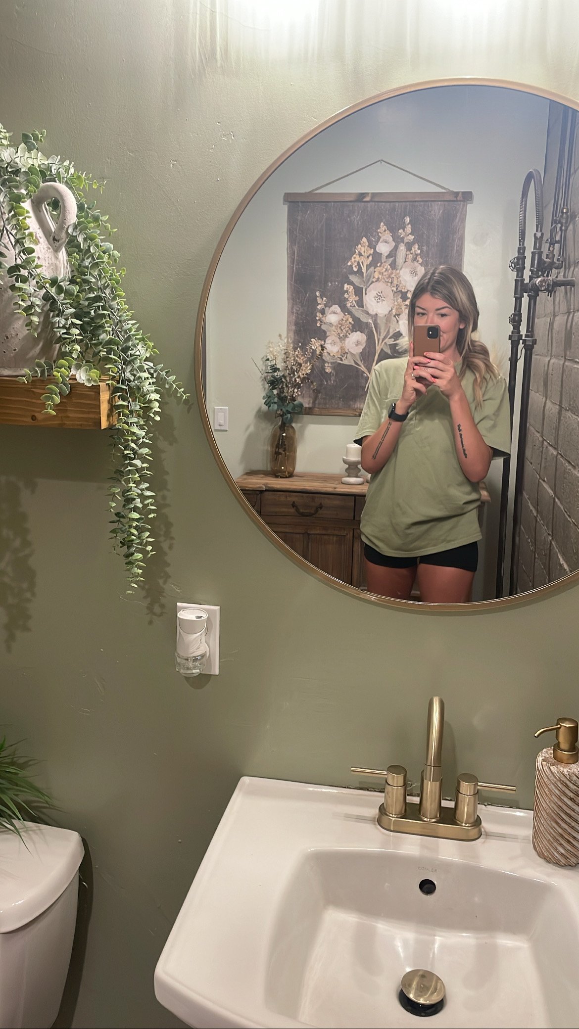 Quick office bathroom makeover! All new paint color, gold hardware, wood floating shelves, new lighting, mirror & decor! 