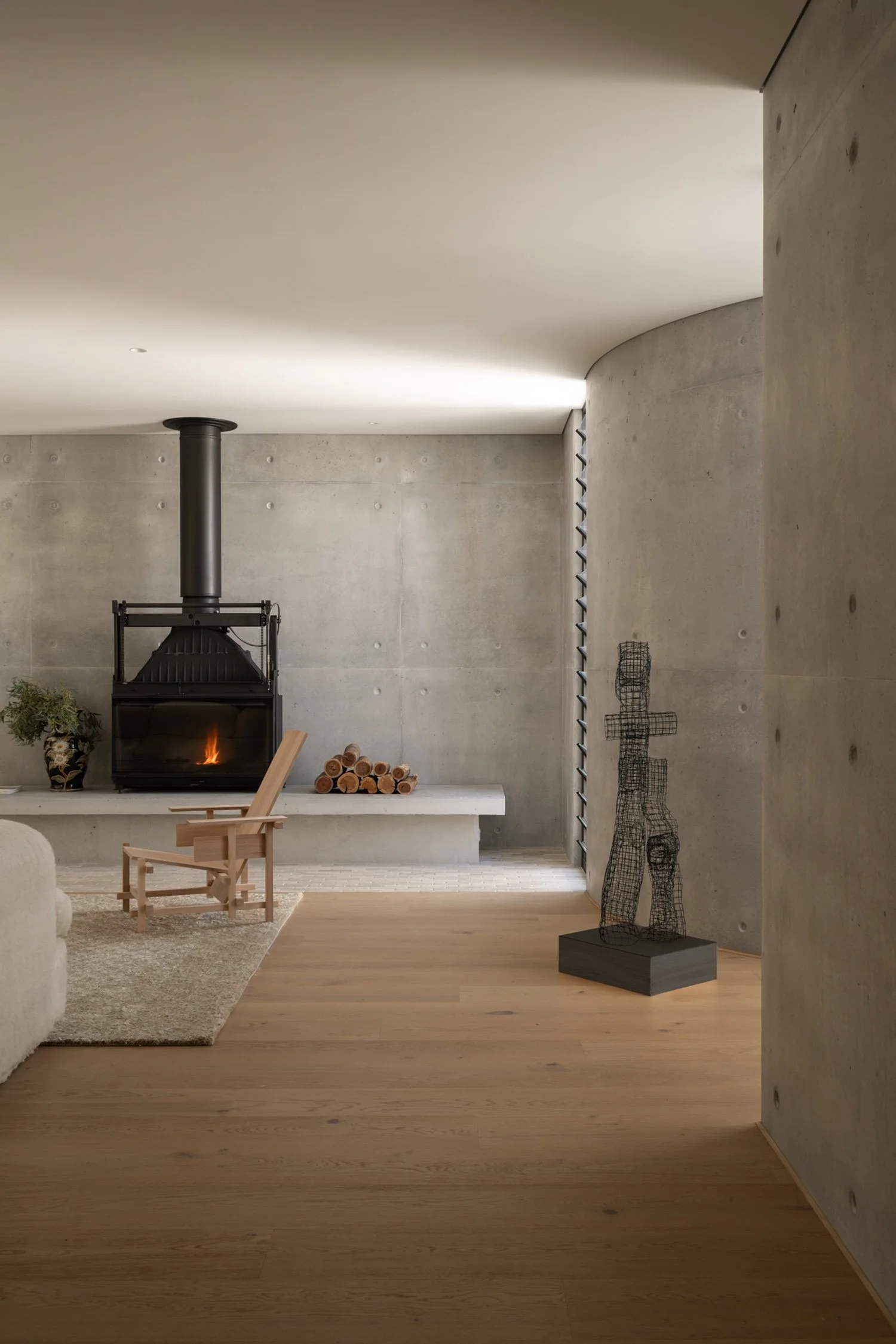 perth-swanbourne-maek-custom-luxury-home-off-form-concrete-interior-design-seguin-fireplace-1.jpg