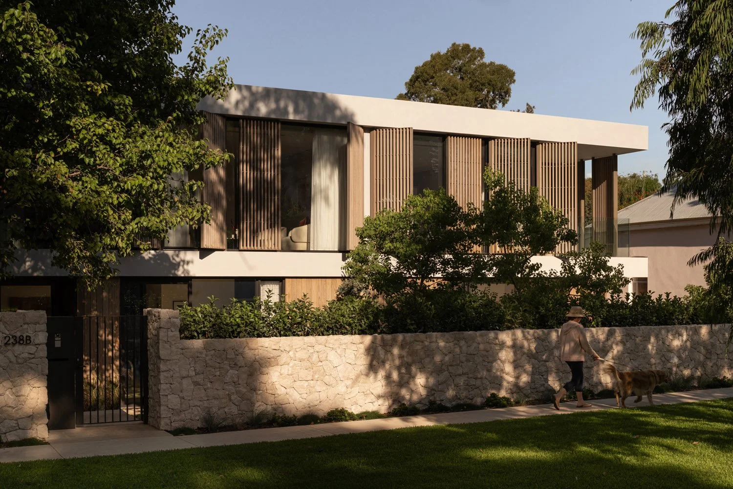 perth-cottesloe-maek-custom-luxury-home-exterior-timber-screen-stone-fence-landscaping-3.jpg