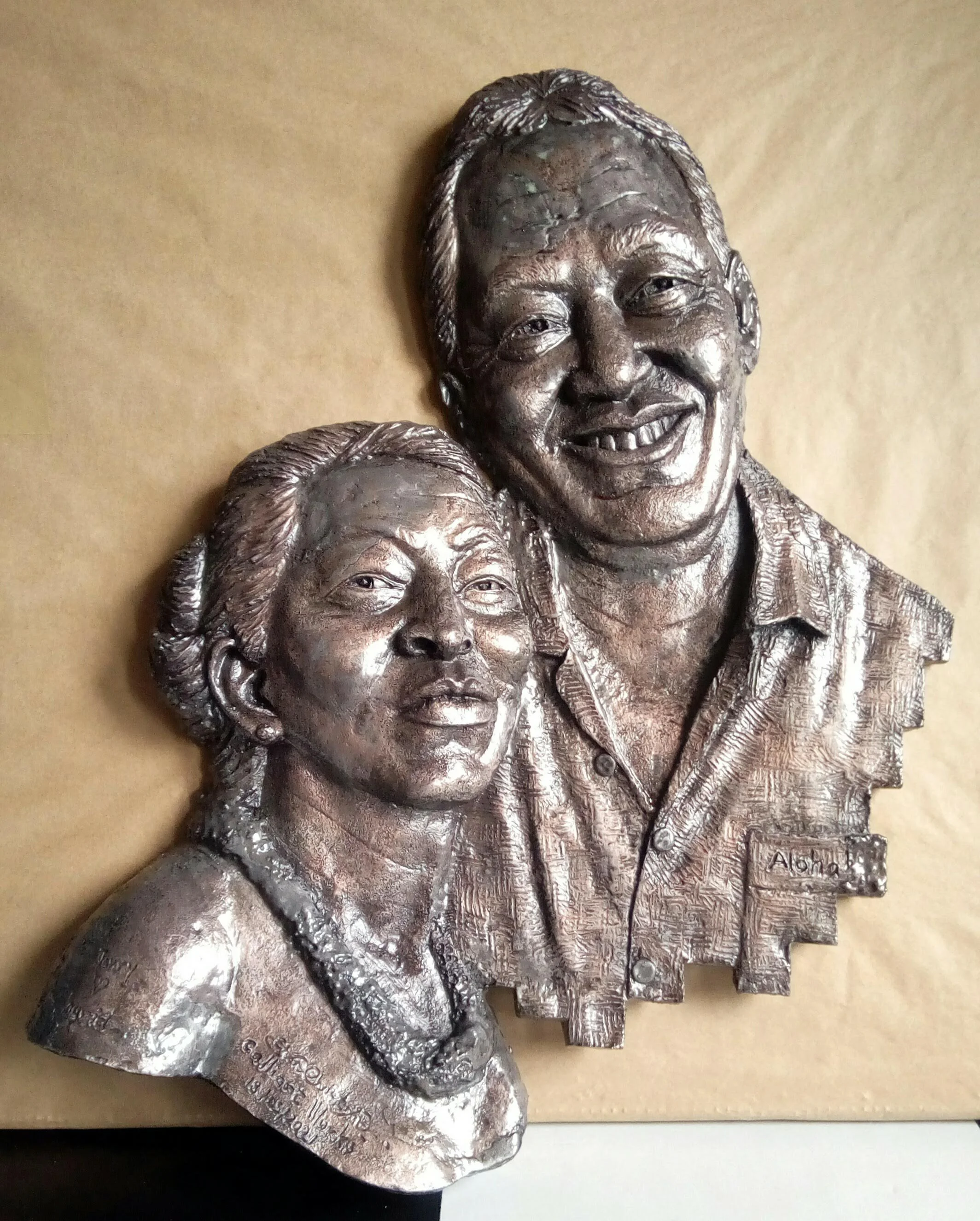 Ebenezer Christian,  Aloha, Bronze powder, resin, fibreglass, 50cmX40cmX5cm.jpg