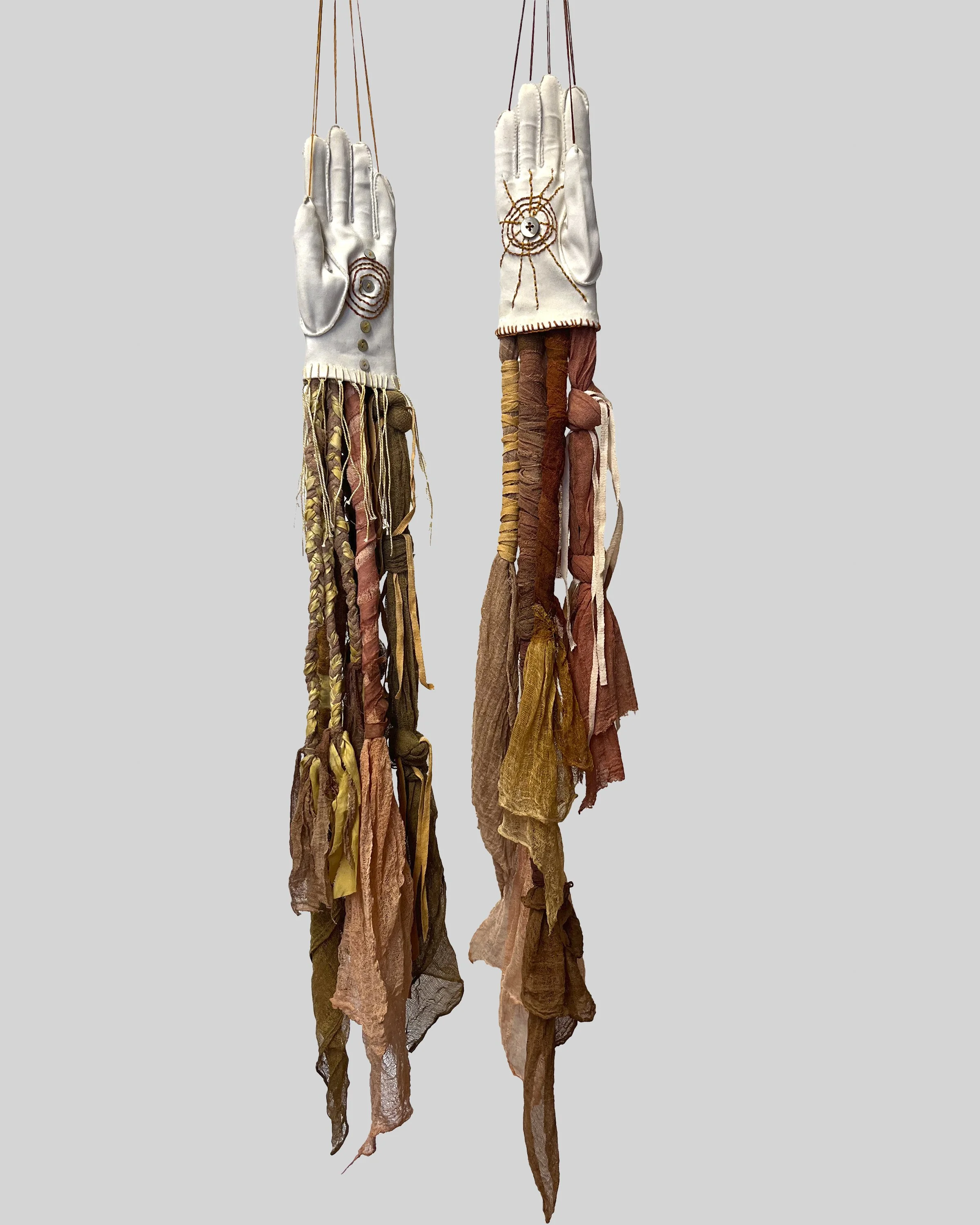 White Glove,  2025  3’ x 6”, Vintage glove, cheesecloth, silk, cotton thread, shell buttons  Dyes: Redwood cones, iron; madder,  $200.