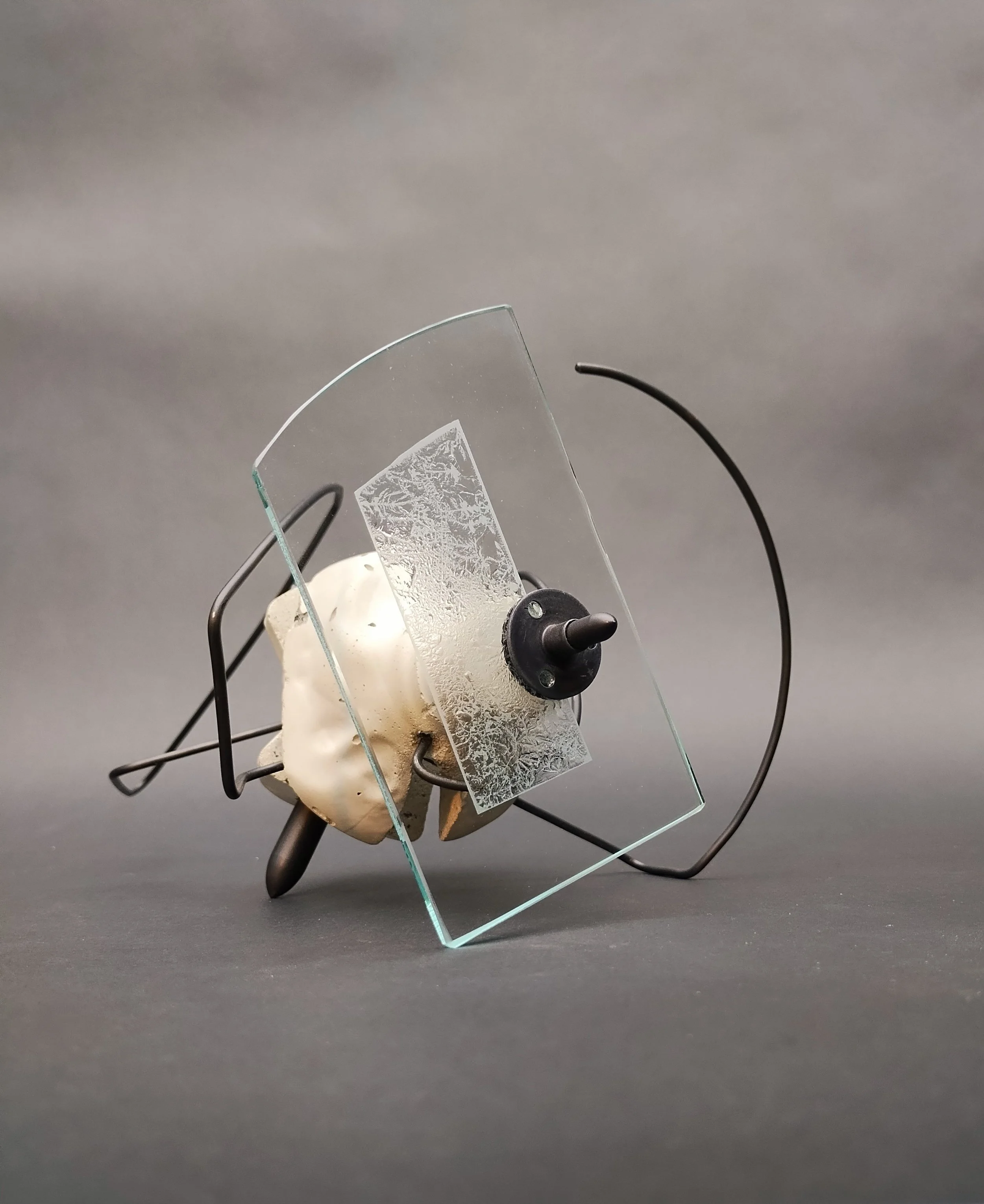 Danny Rosales, Part #33, 2026, concrete, glass and steel, 7x11x7", $550