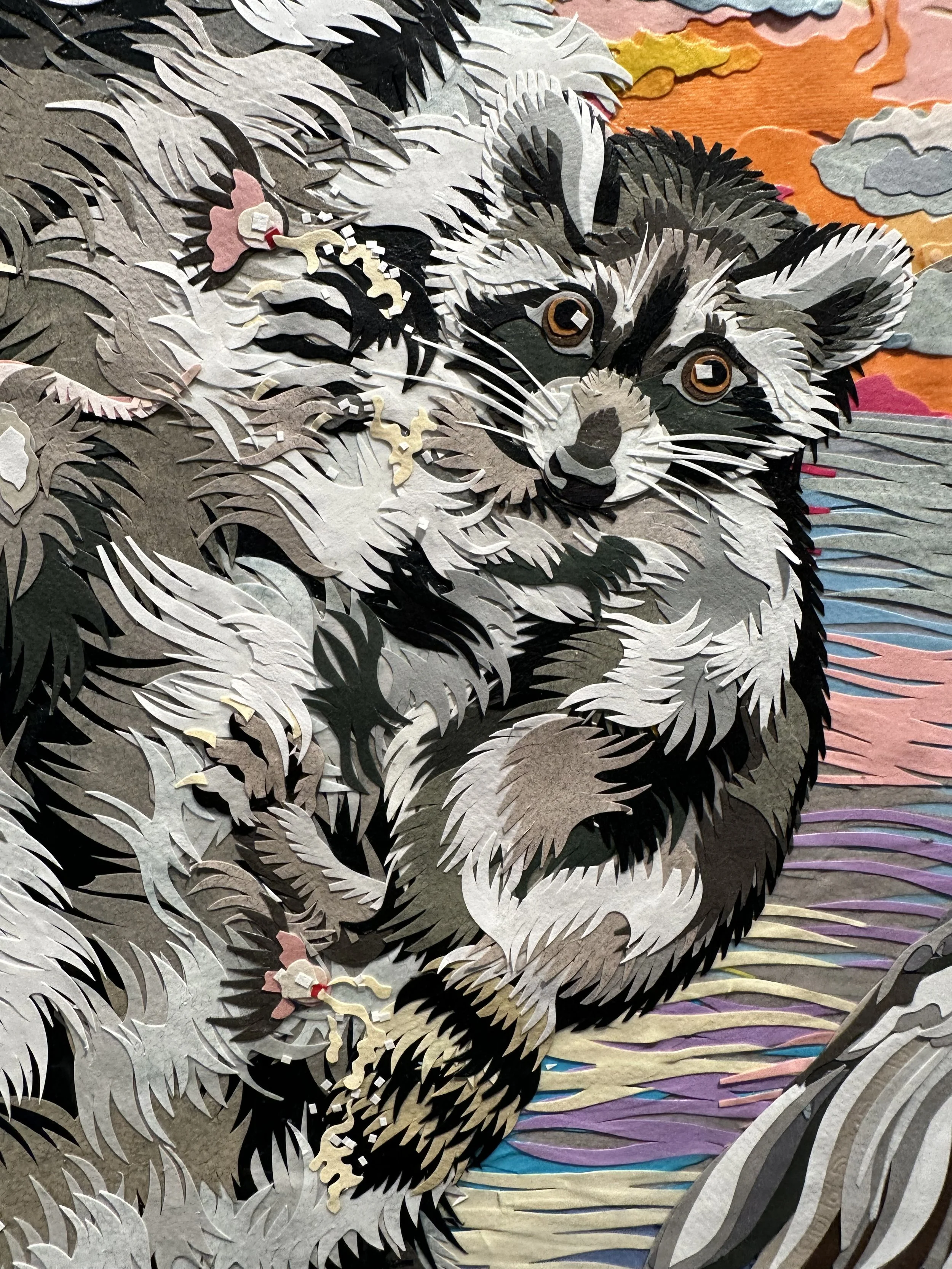 "Birth of Raccoon,' 72X48in, handout paper and gel medium on canvas, 2022, DETAIL.