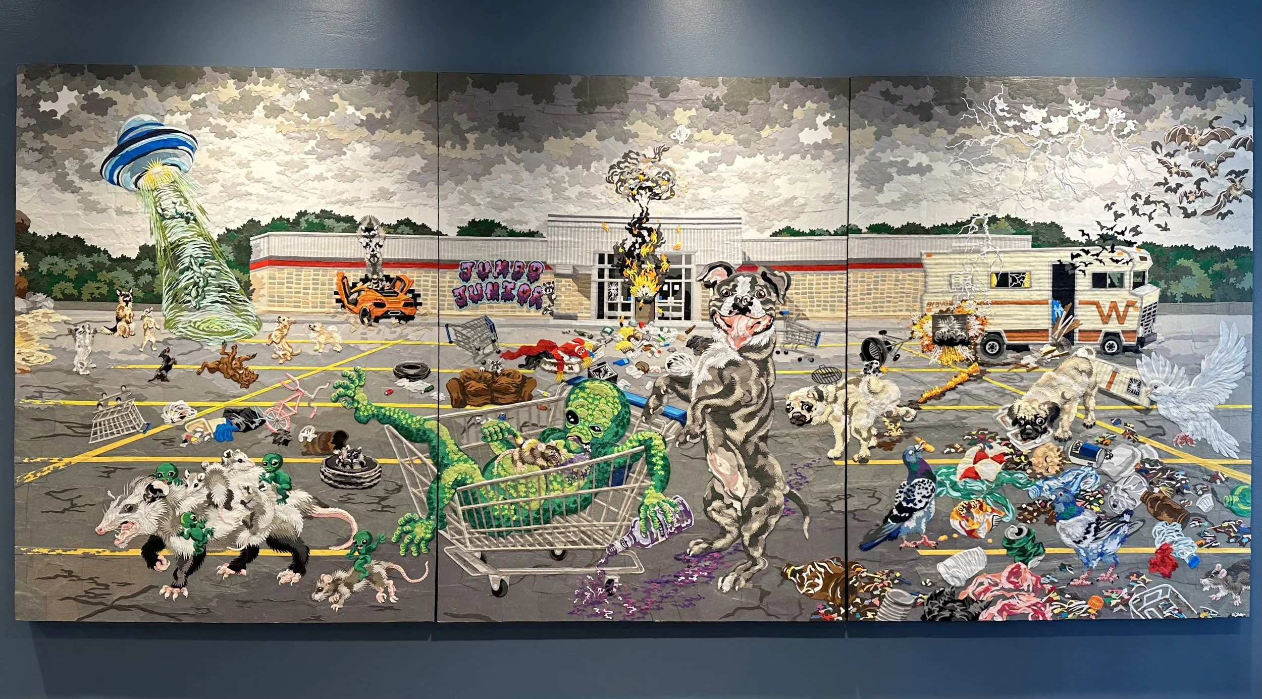 "Parking Lot," 48x108in, handout paper and gel medium on wood panels, 2018.