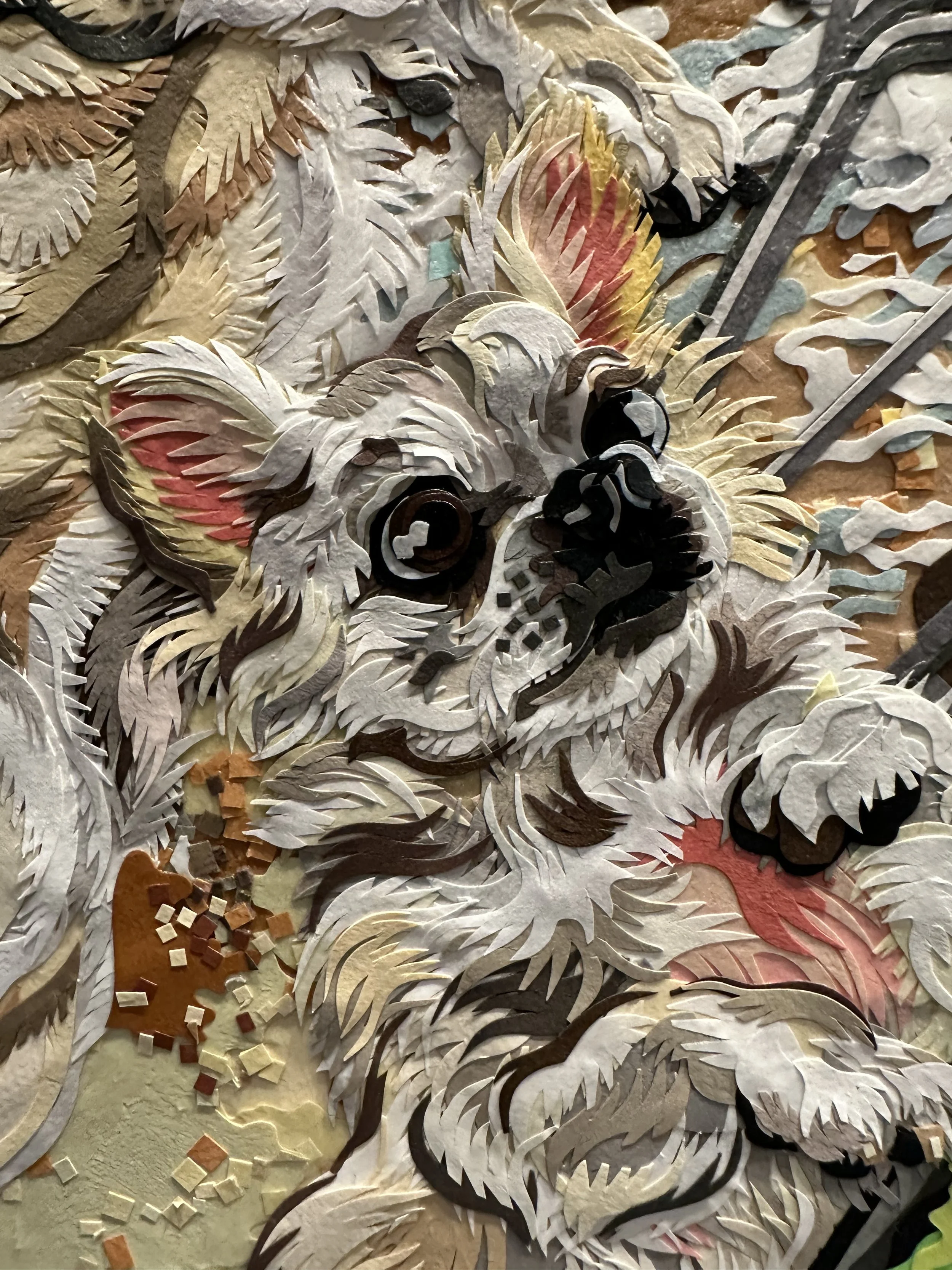 "Birth of Raccoon,' 72X48in, handout paper and gel medium on canvas, 2022, DETAIL.