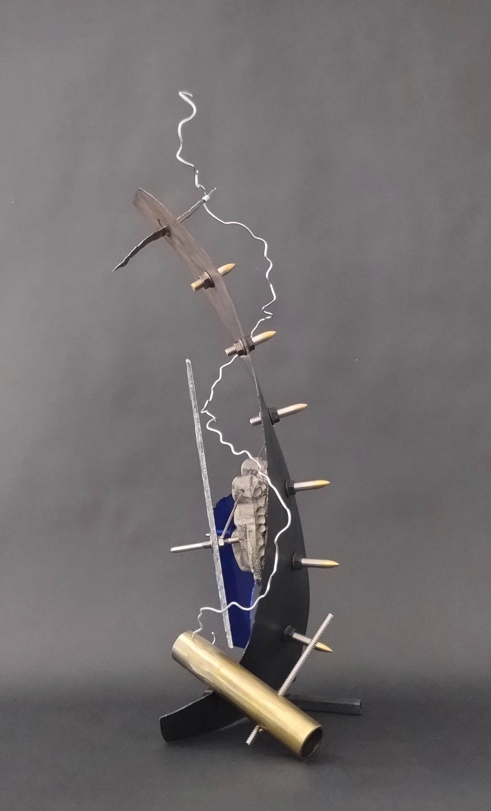 Danny Rosales, Defiance, 2026, concrete, glass and steel, 22x10x9", $1900